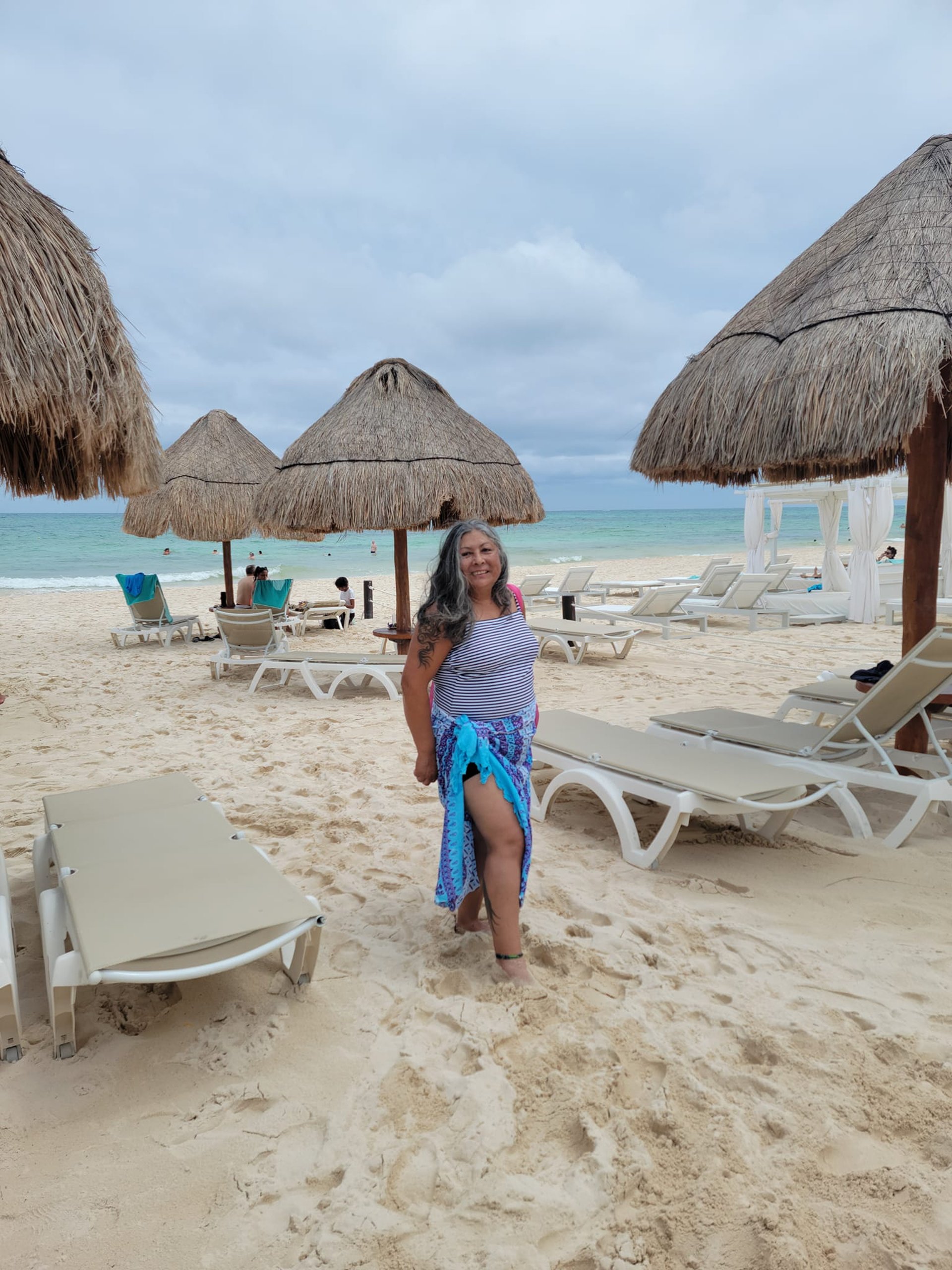 an abstract photo of a curved building with a blue sky in the background