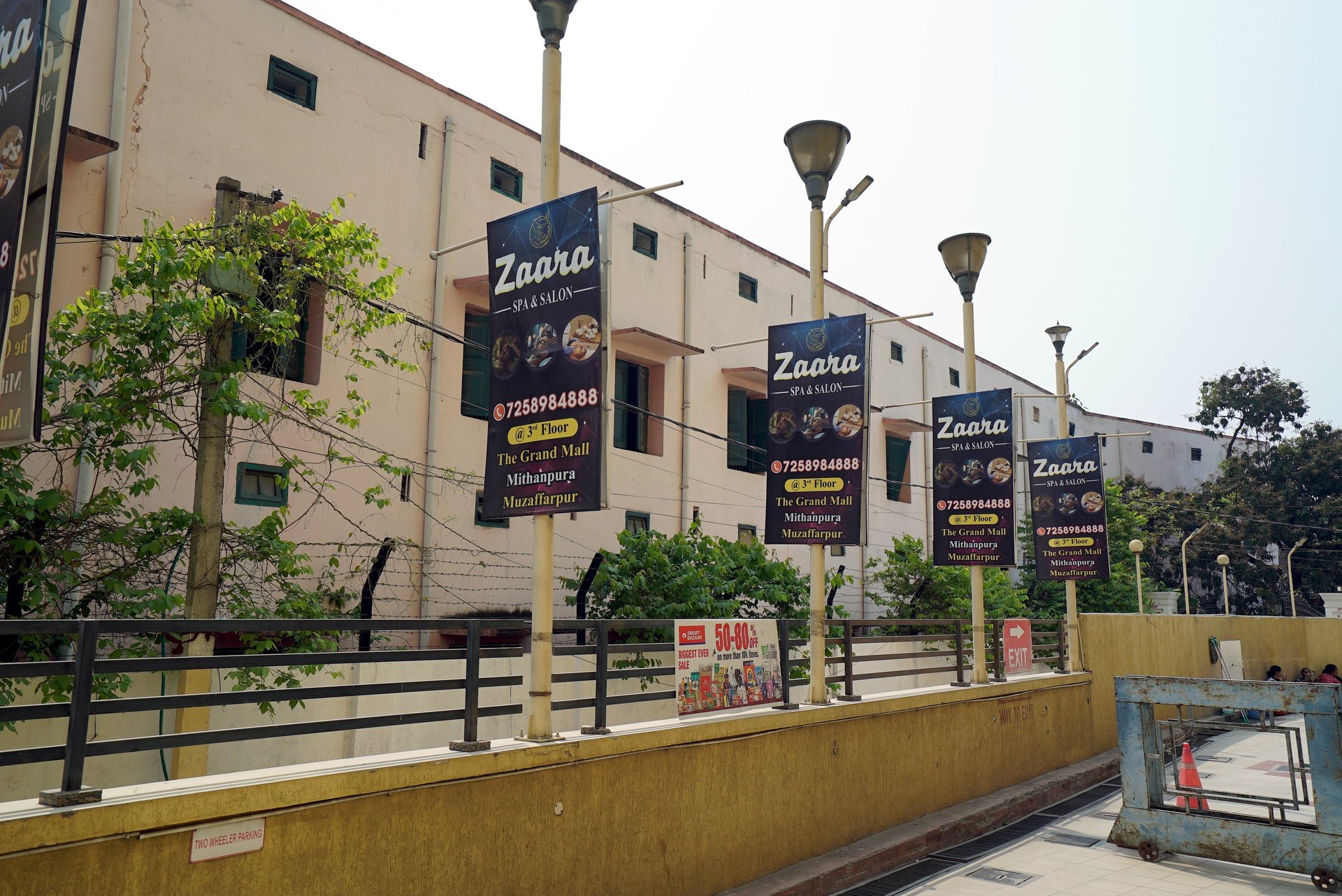 a person laying in a bed with their feet up