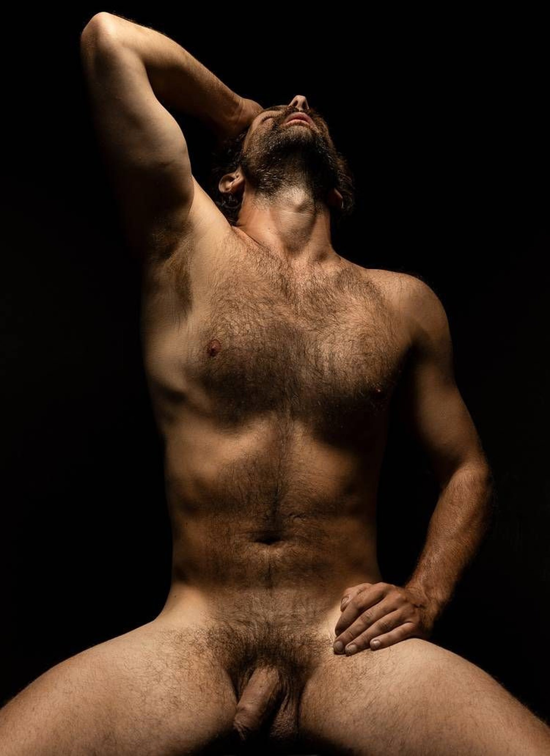 an abstract photo of a curved building with a blue sky in the background