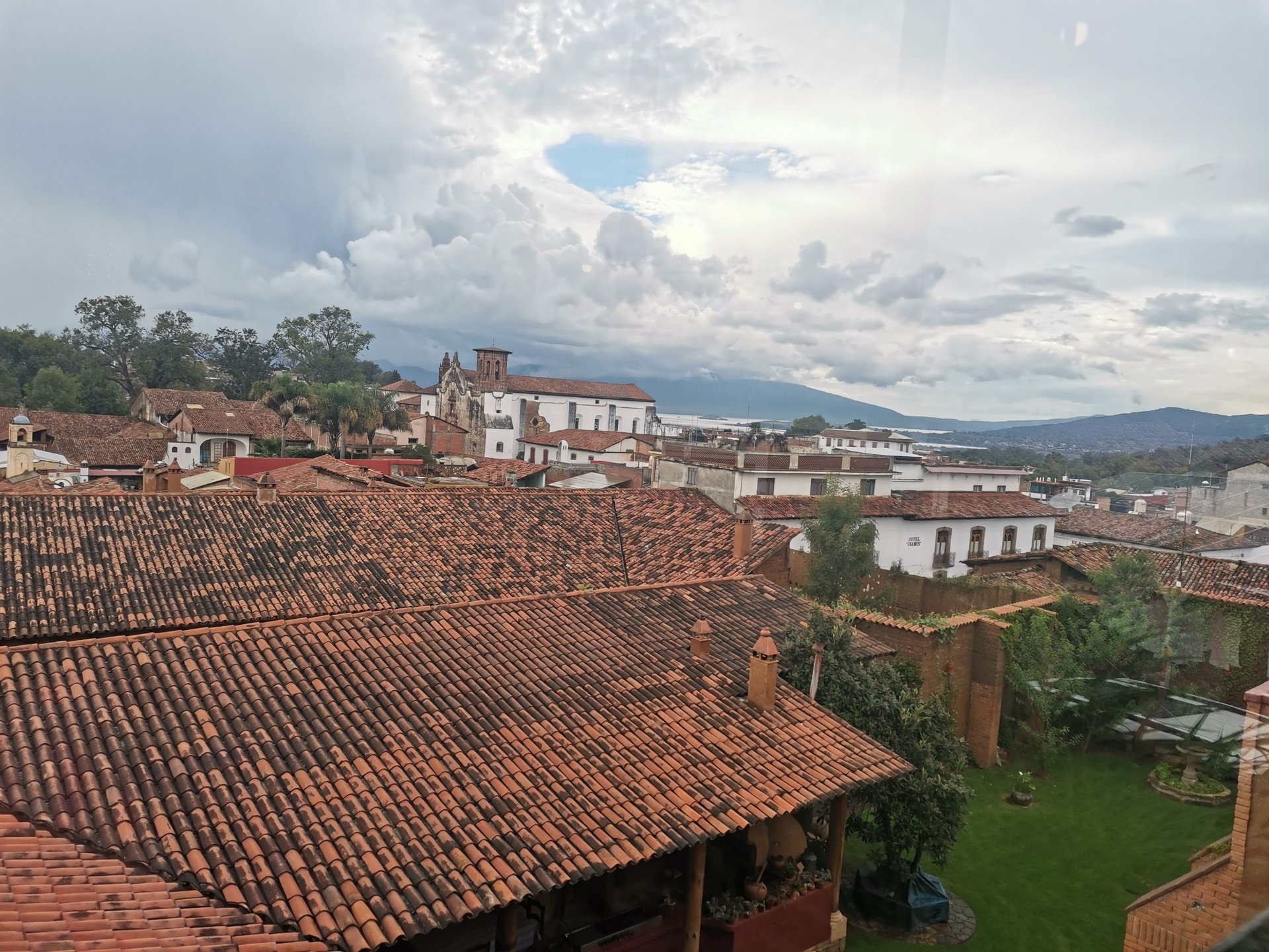 black and brown leather padded tub sofa