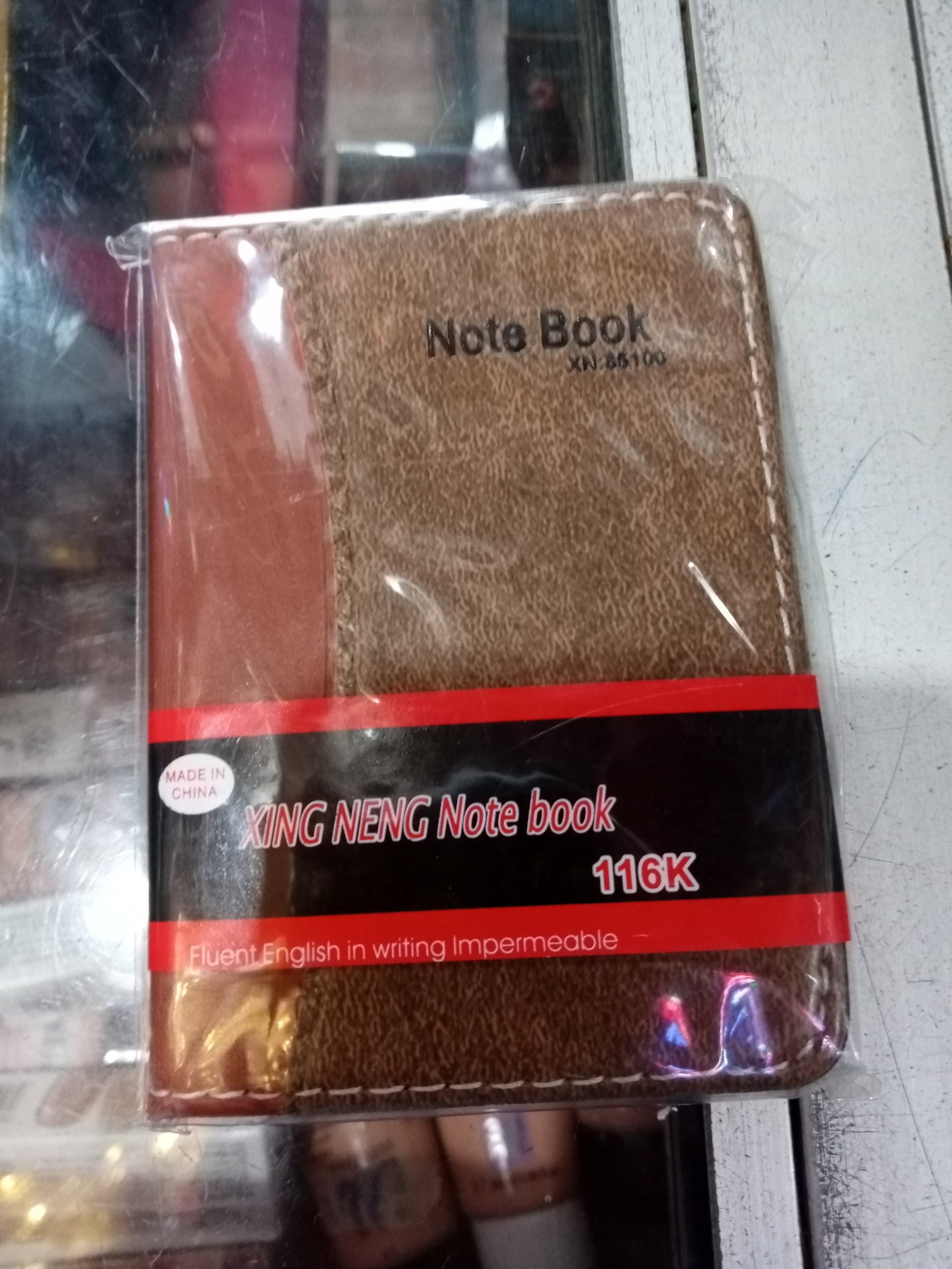 person wearing grey knit sweater