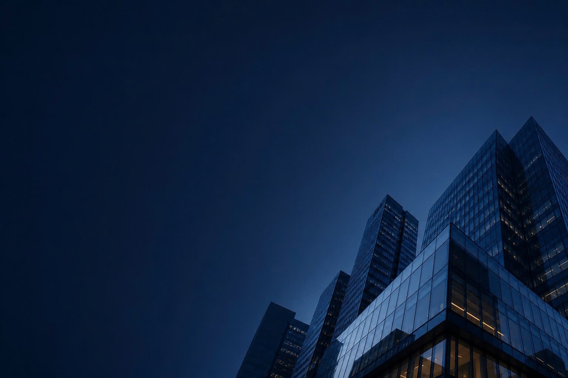 an abstract photo of a curved building with a blue sky in the background