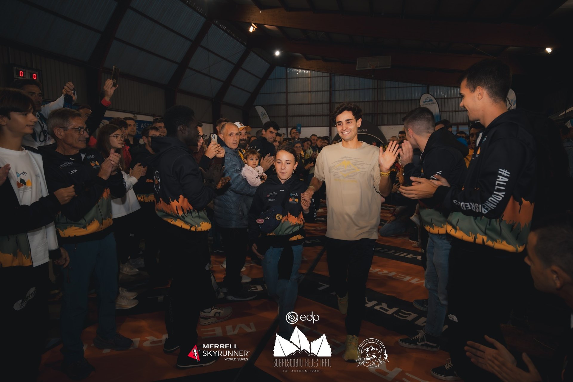 an abstract photo of a curved building with a blue sky in the background