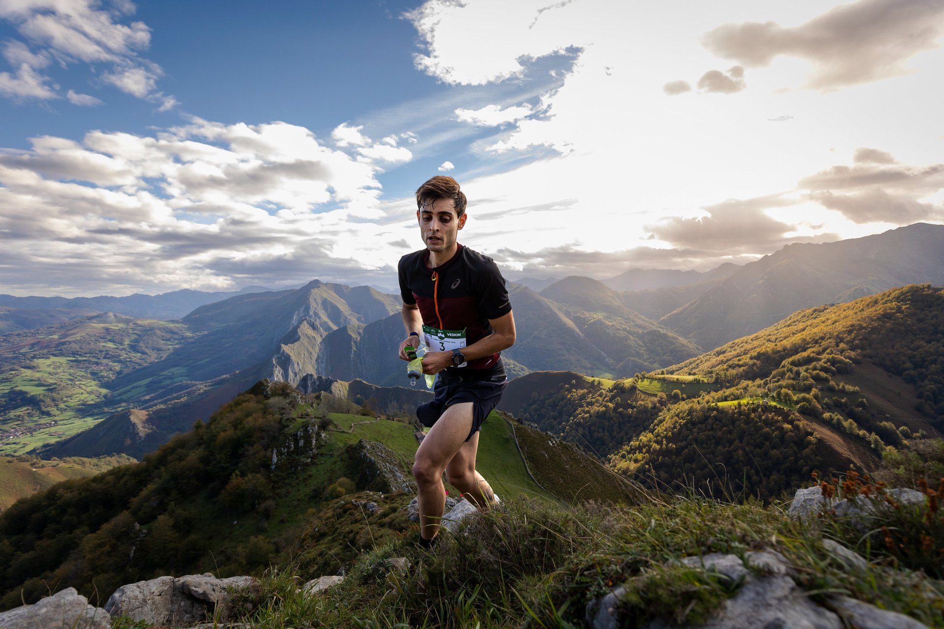 an abstract photo of a curved building with a blue sky in the background