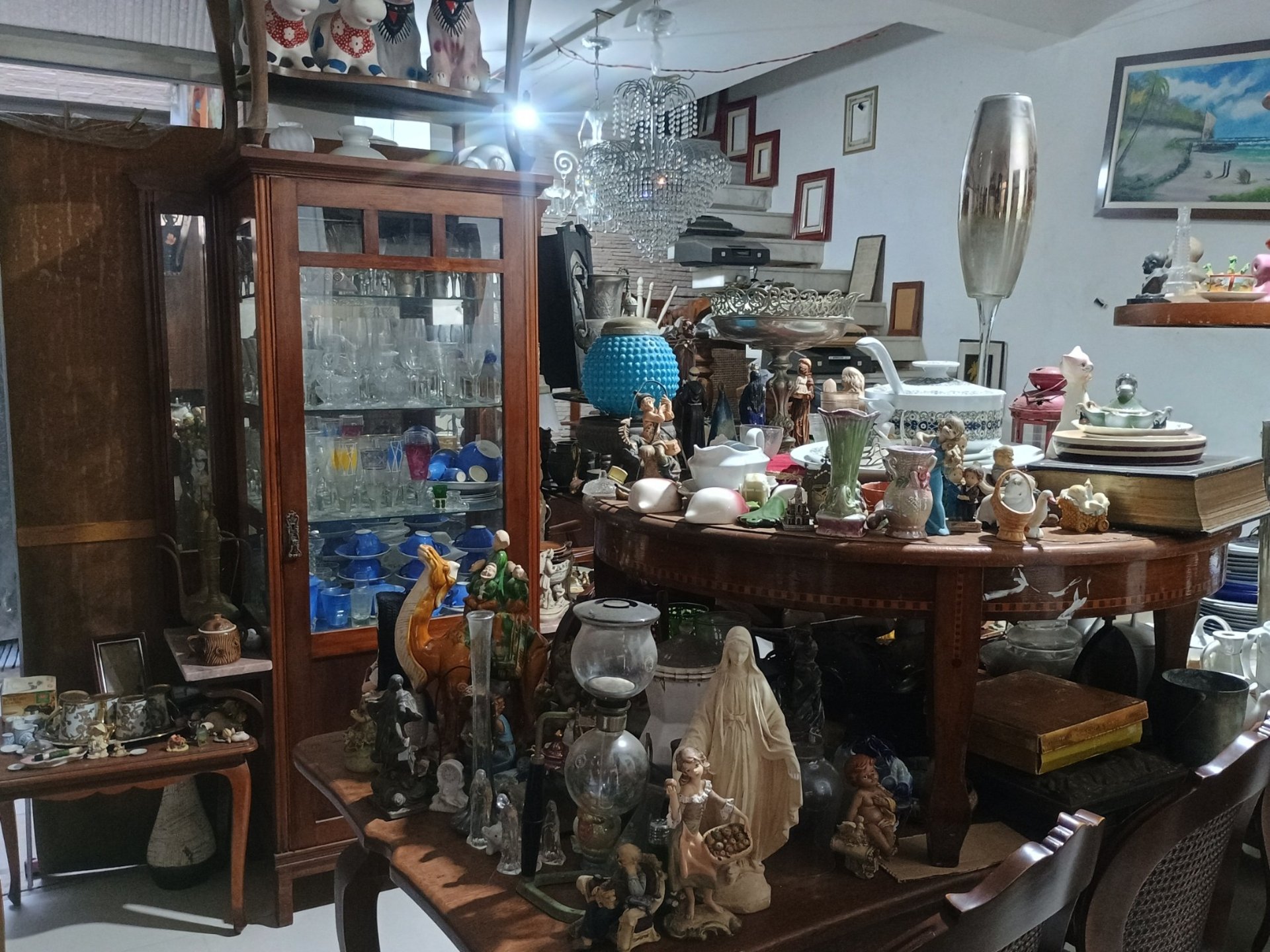 a brick wall with three clocks on it