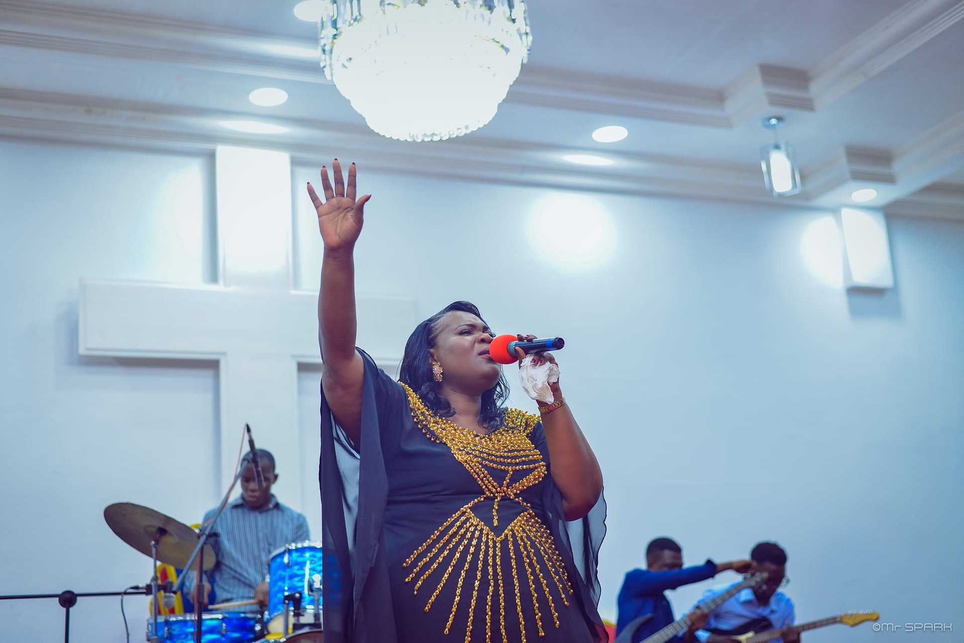 an abstract photo of a curved building with a blue sky in the background