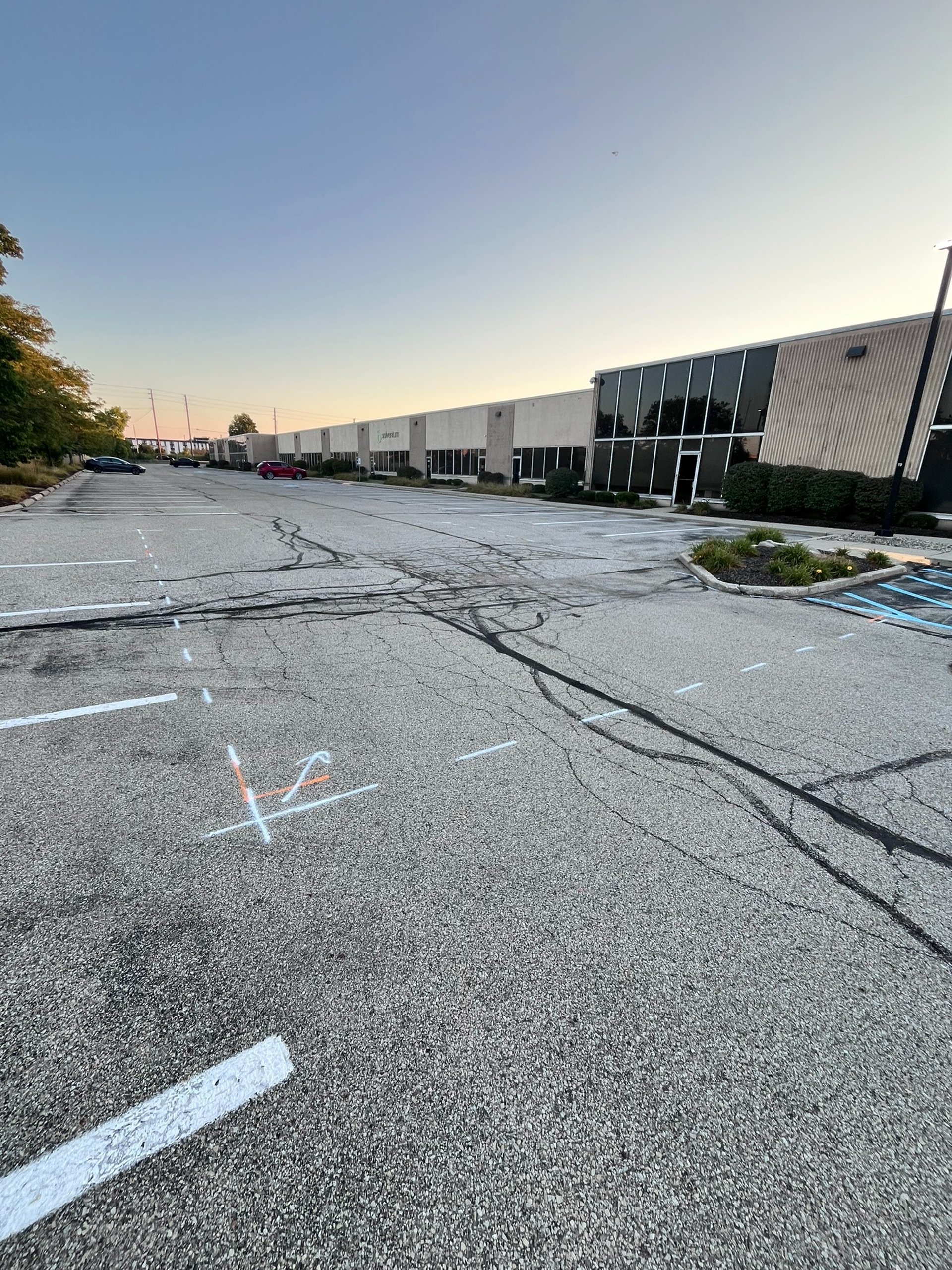 black and yellow line on gray concrete pavement