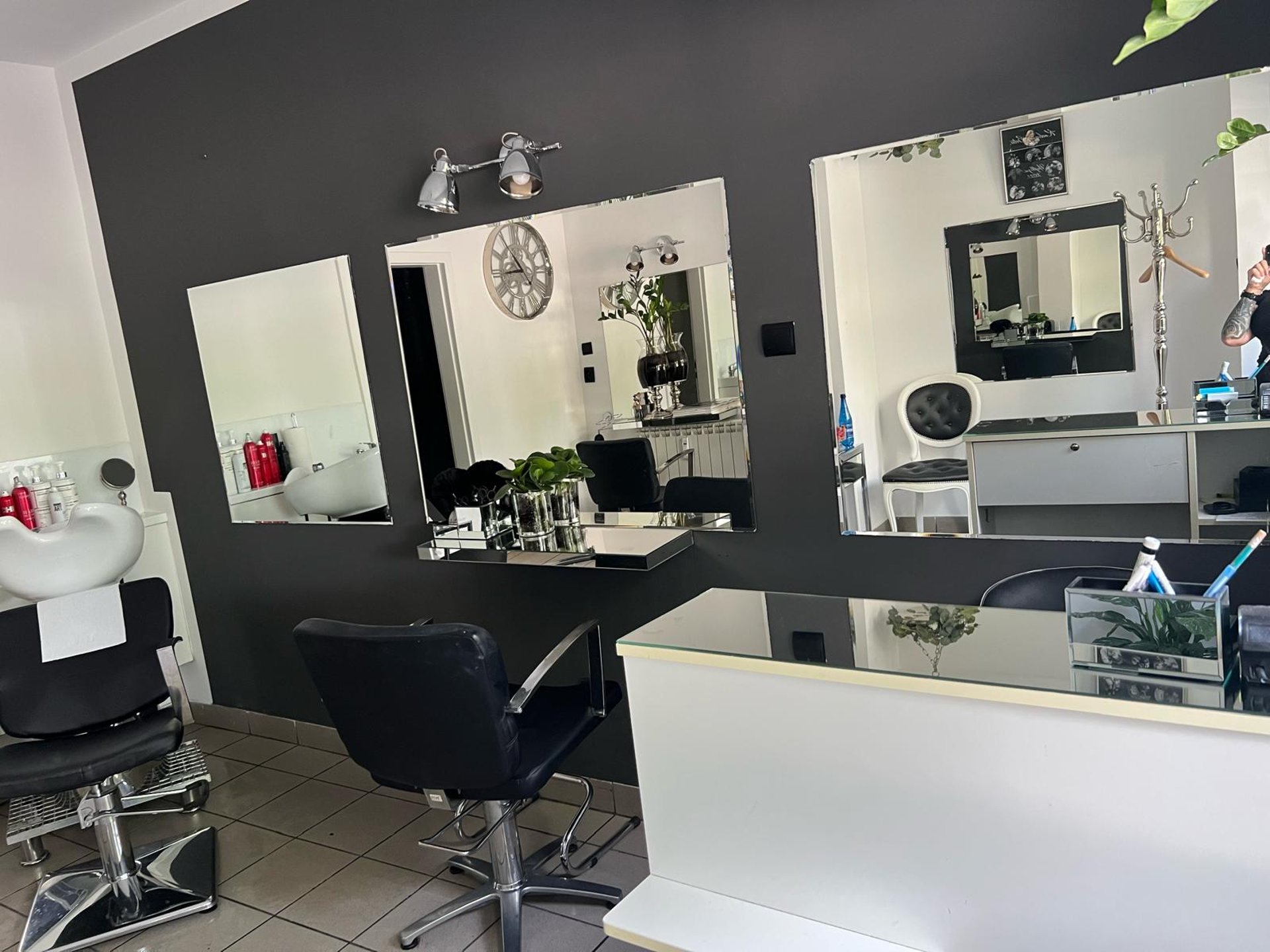 black and brown leather padded tub sofa