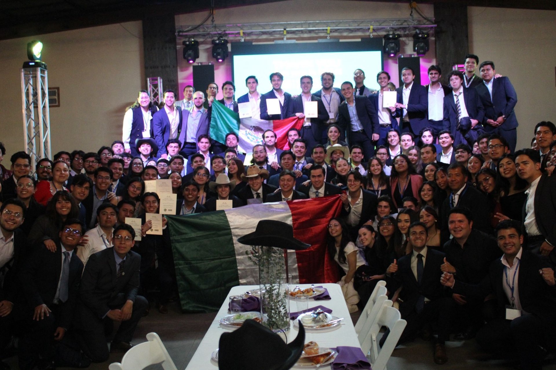 an abstract photo of a curved building with a blue sky in the background