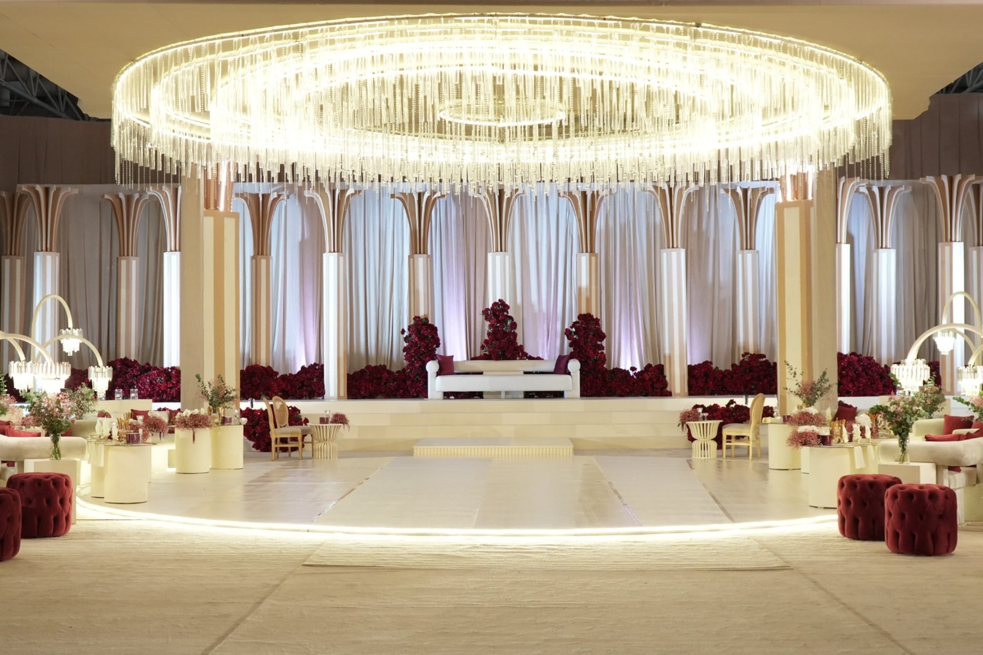 gold-colored bridal ring set on pink rose flower bouquet