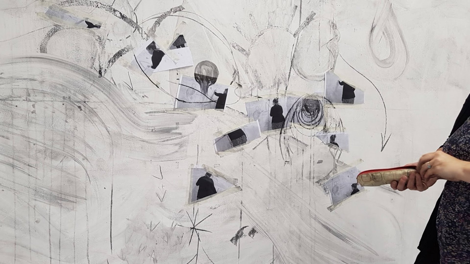 Misty forest path with bare trees and fallen leaves.