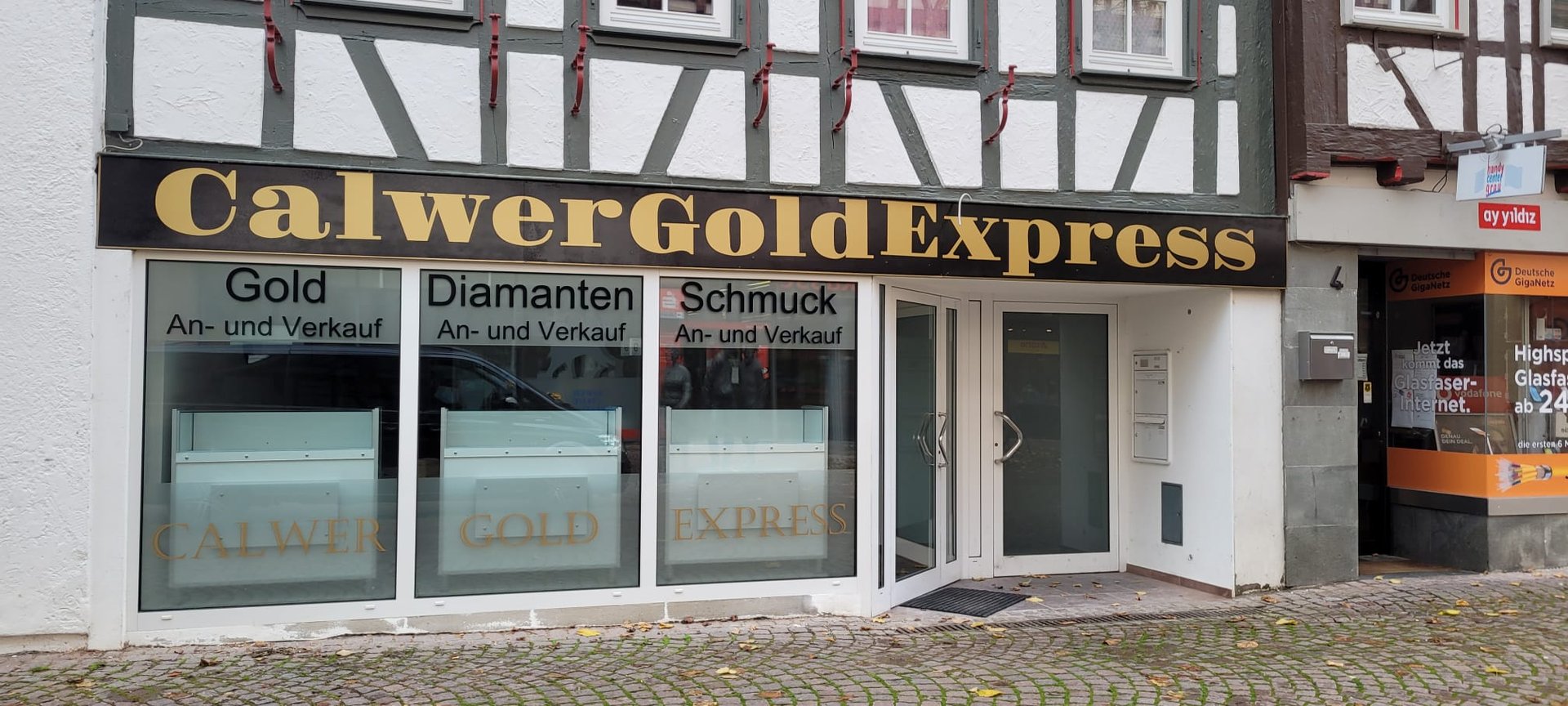 woman wearing yellow long-sleeved dress under white clouds and blue sky during daytime