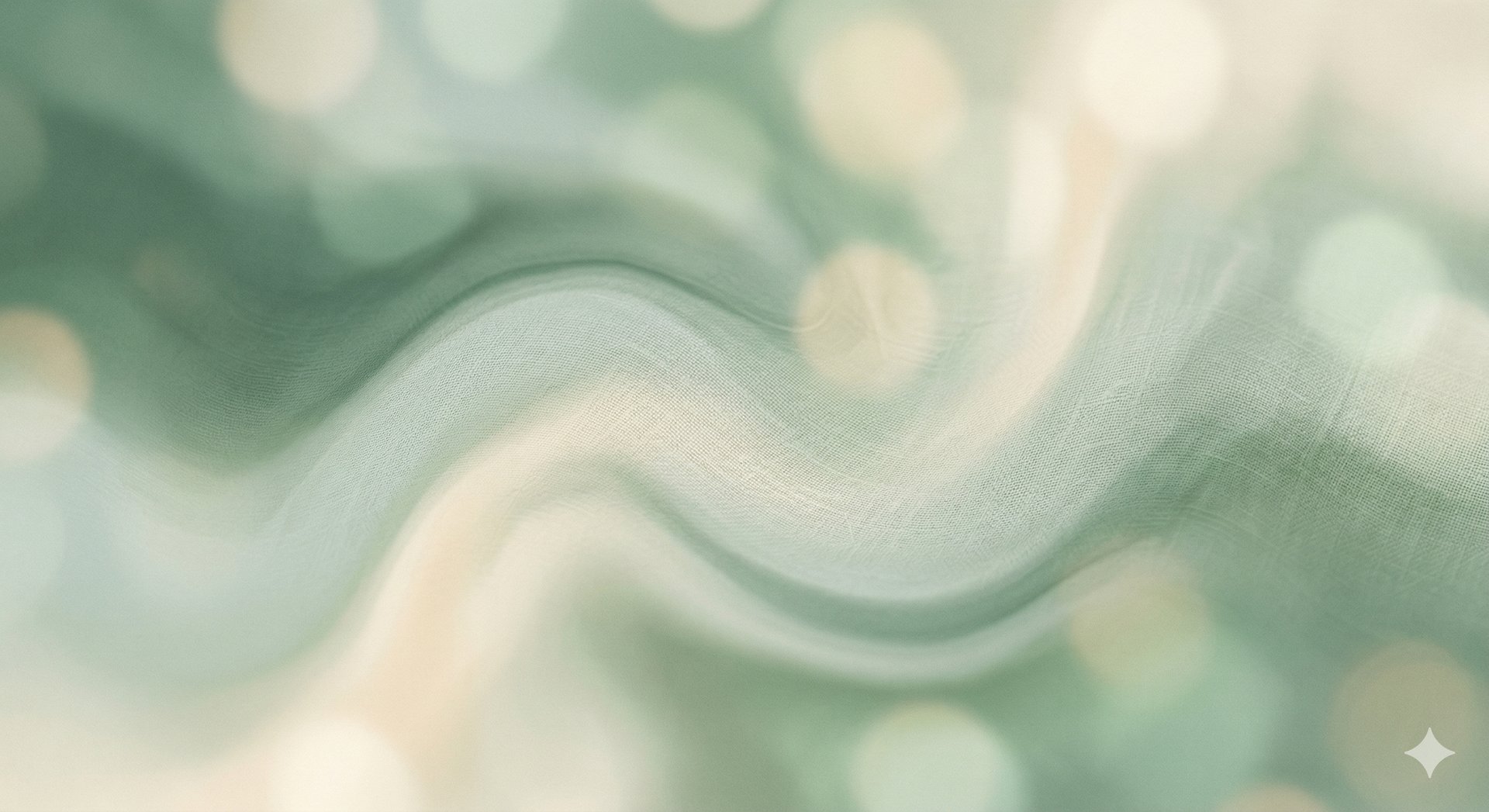 an abstract photo of a curved building with a blue sky in the background