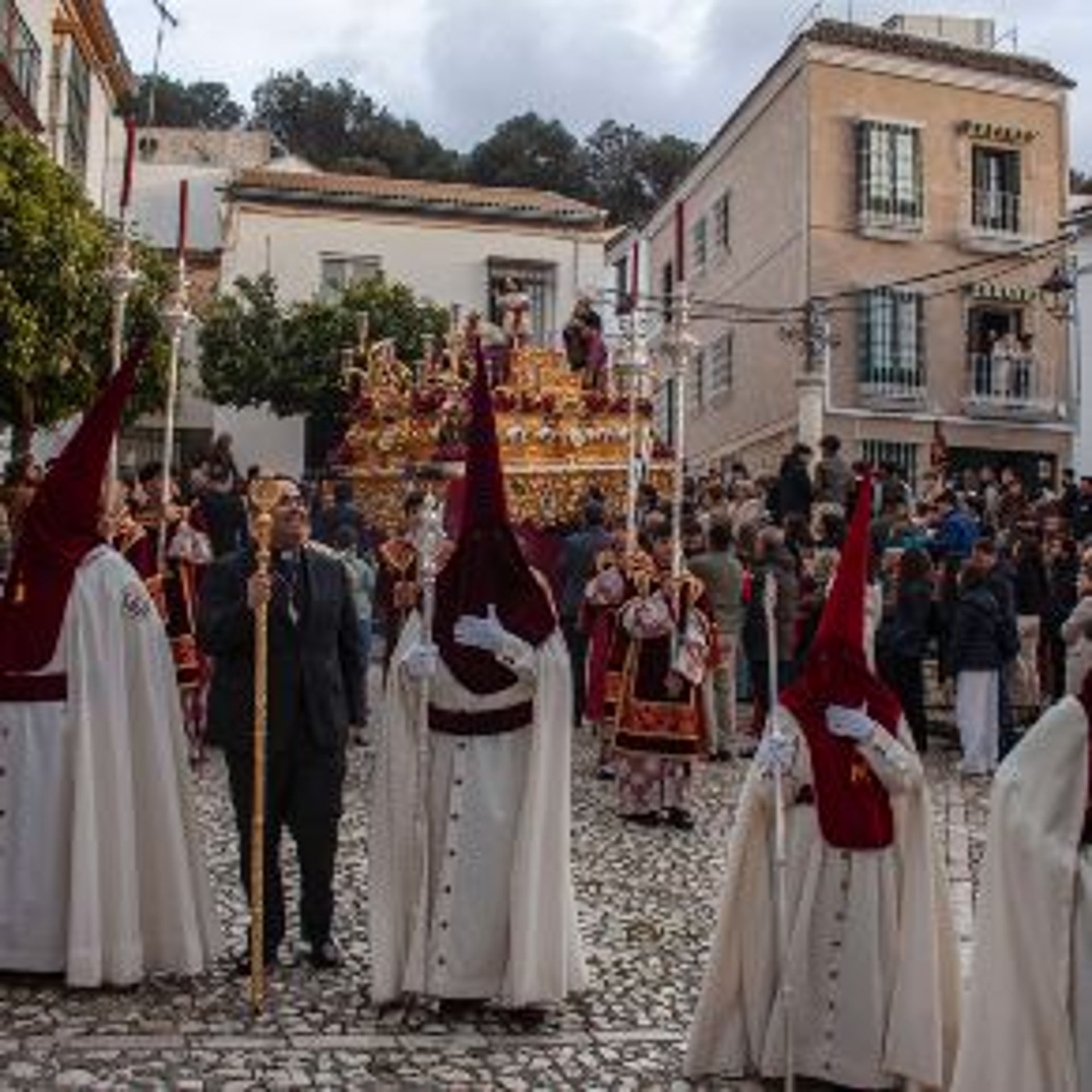 woman wearing yellow long-sleeved dress under white clouds and blue sky during daytime