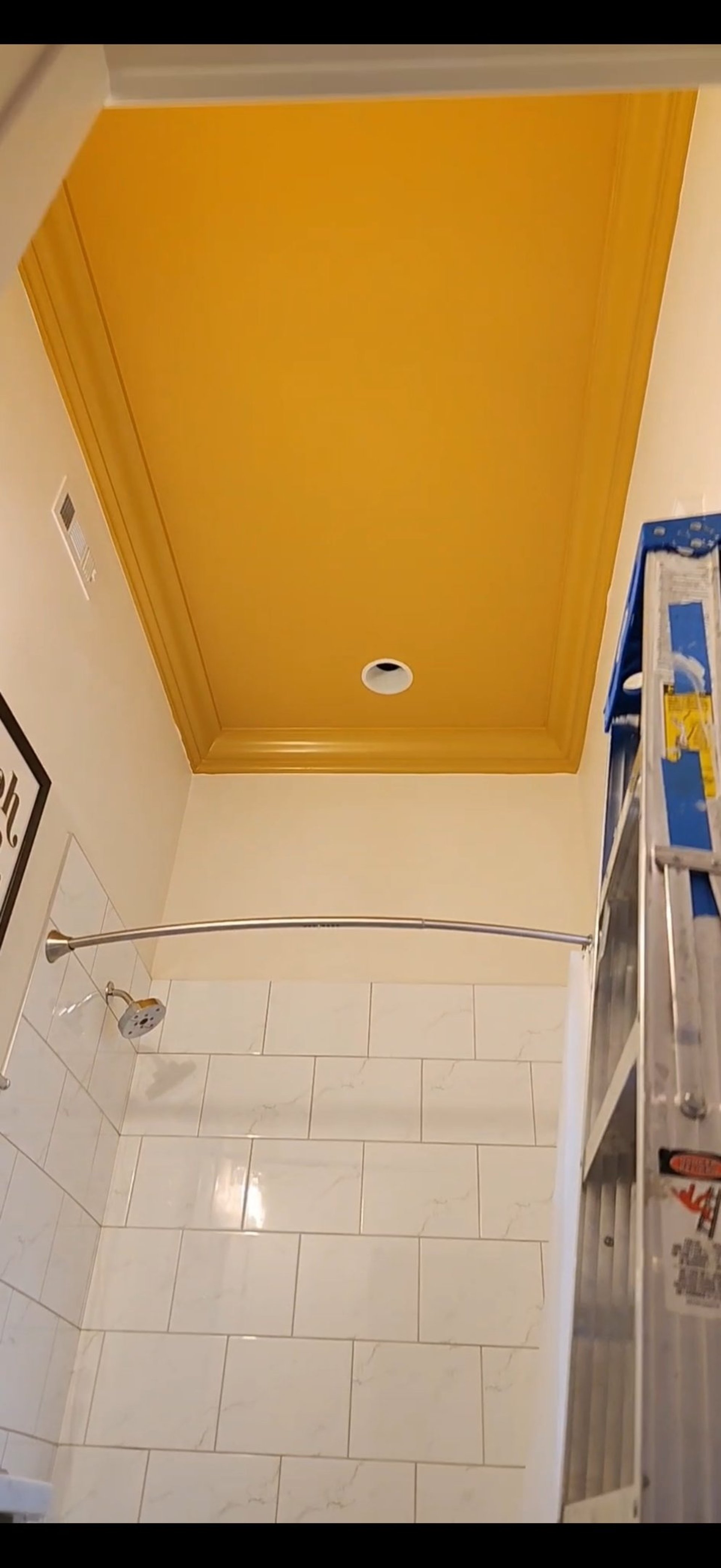 woman wearing yellow long-sleeved dress under white clouds and blue sky during daytime