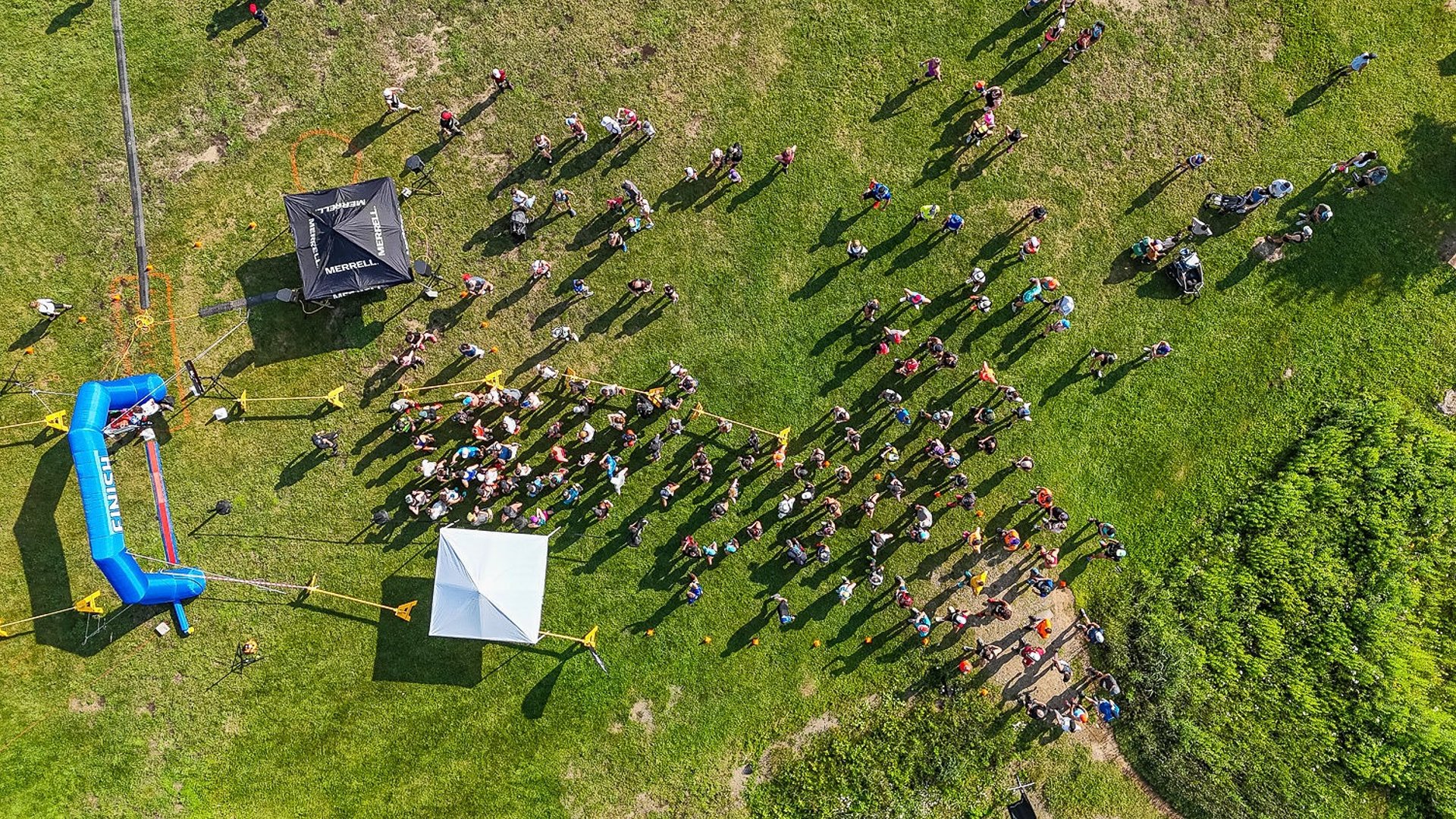 an abstract photo of a curved building with a blue sky in the background