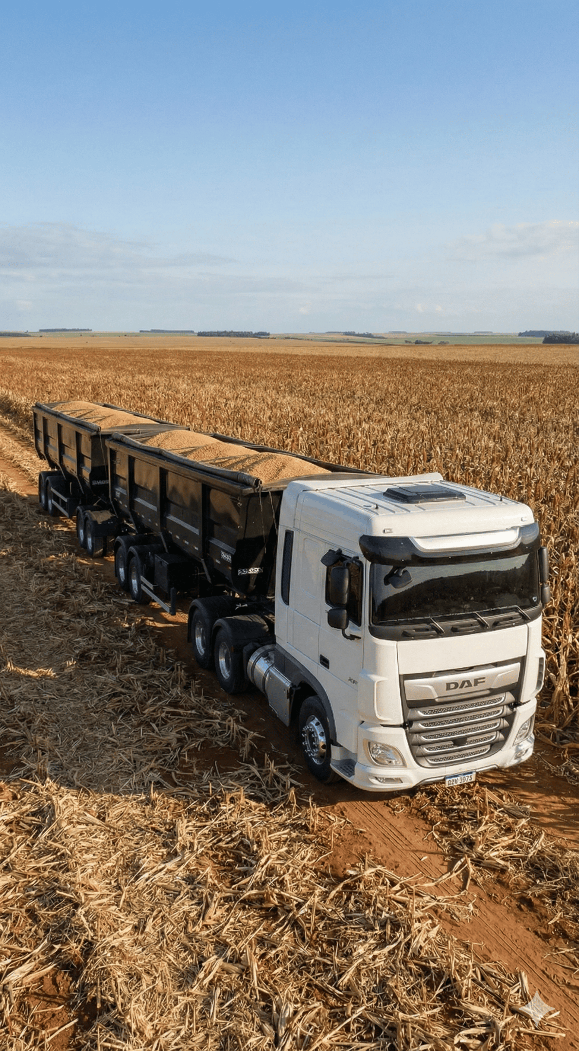 trailer truck passing on road near rail guard
