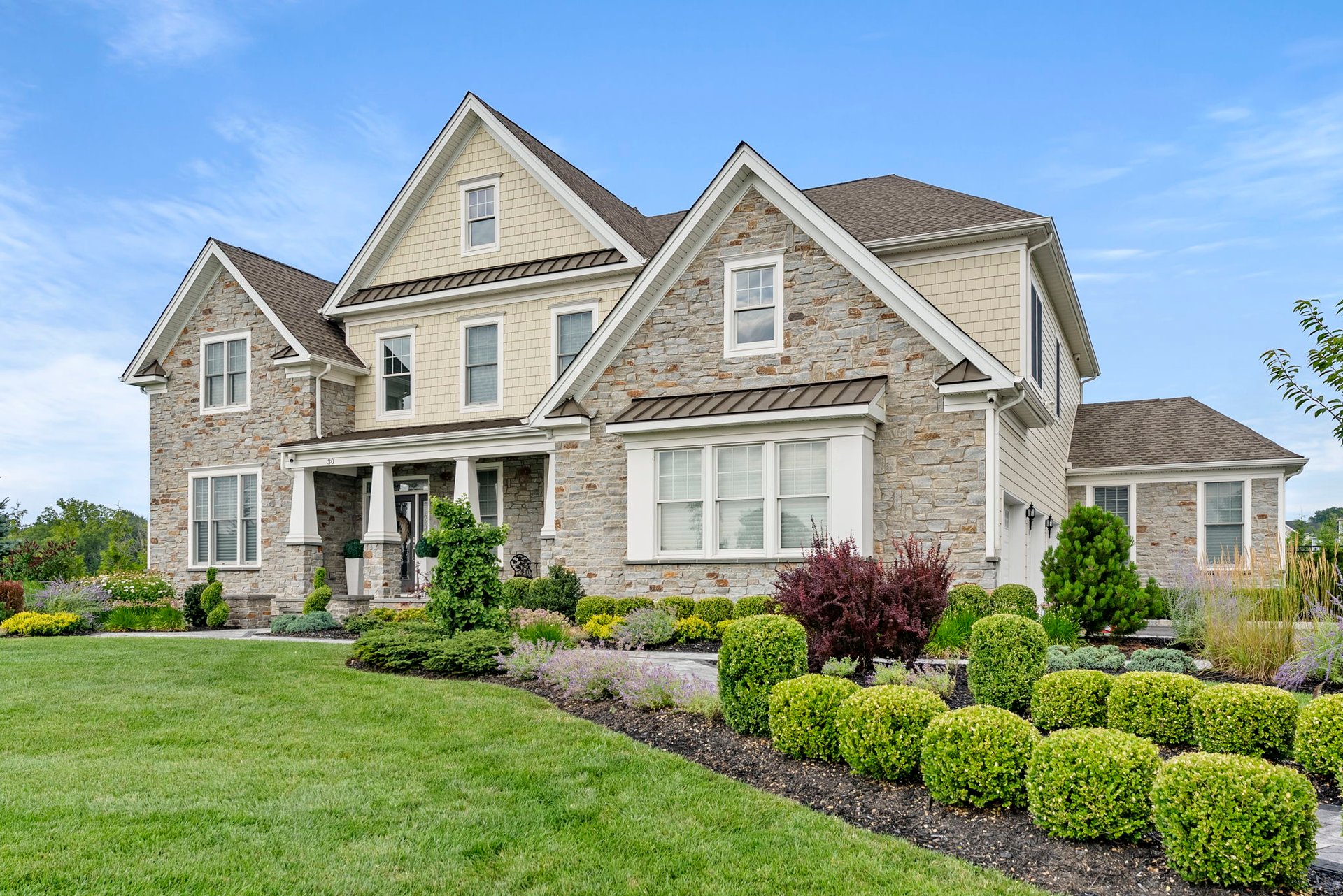 woman wearing yellow long-sleeved dress under white clouds and blue sky during daytime