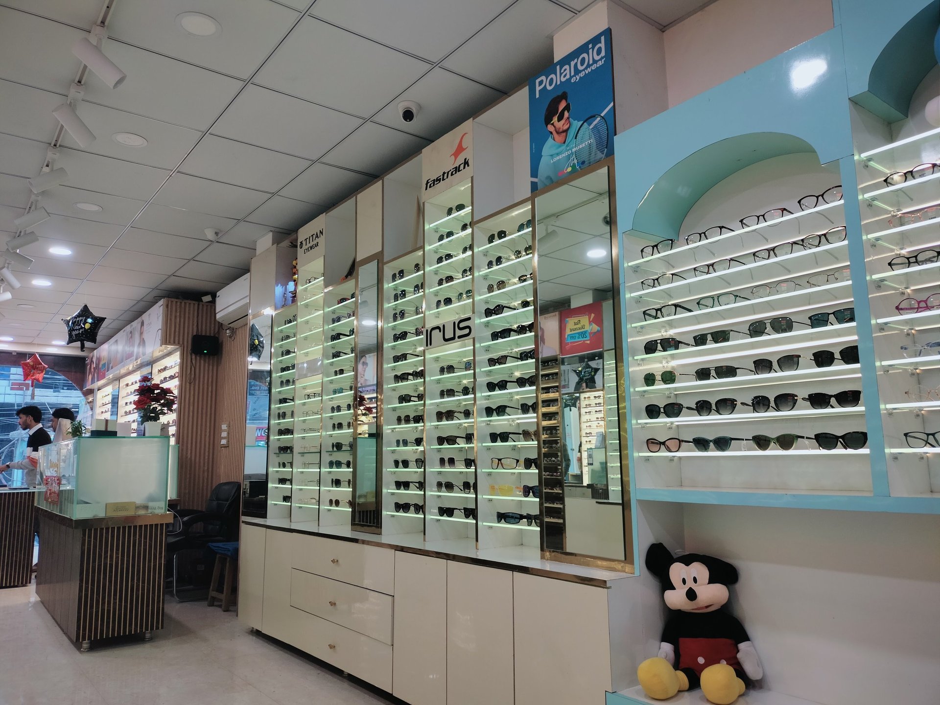 brown framed eyeglasses on white surface