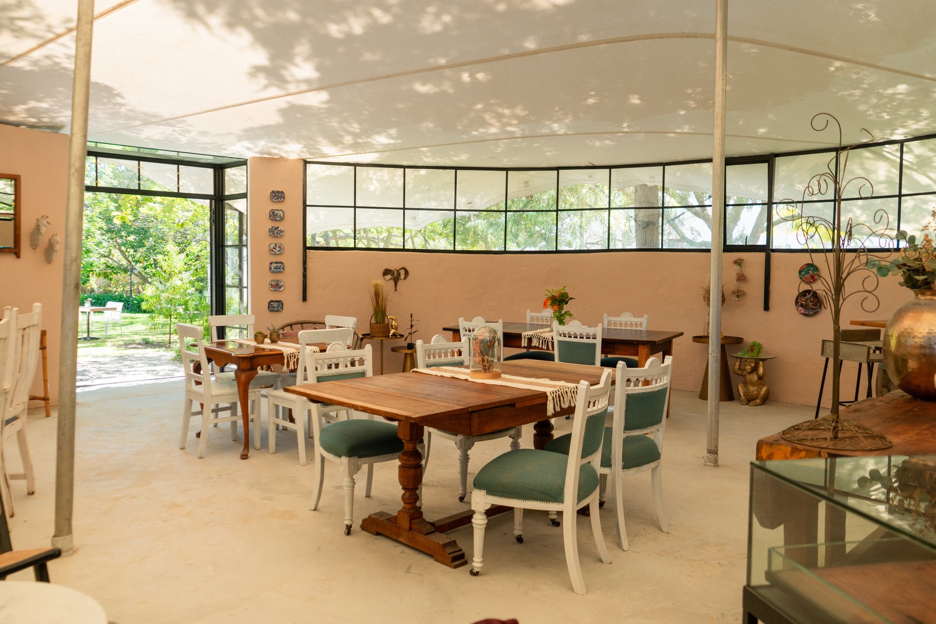 an abstract photo of a curved building with a blue sky in the background