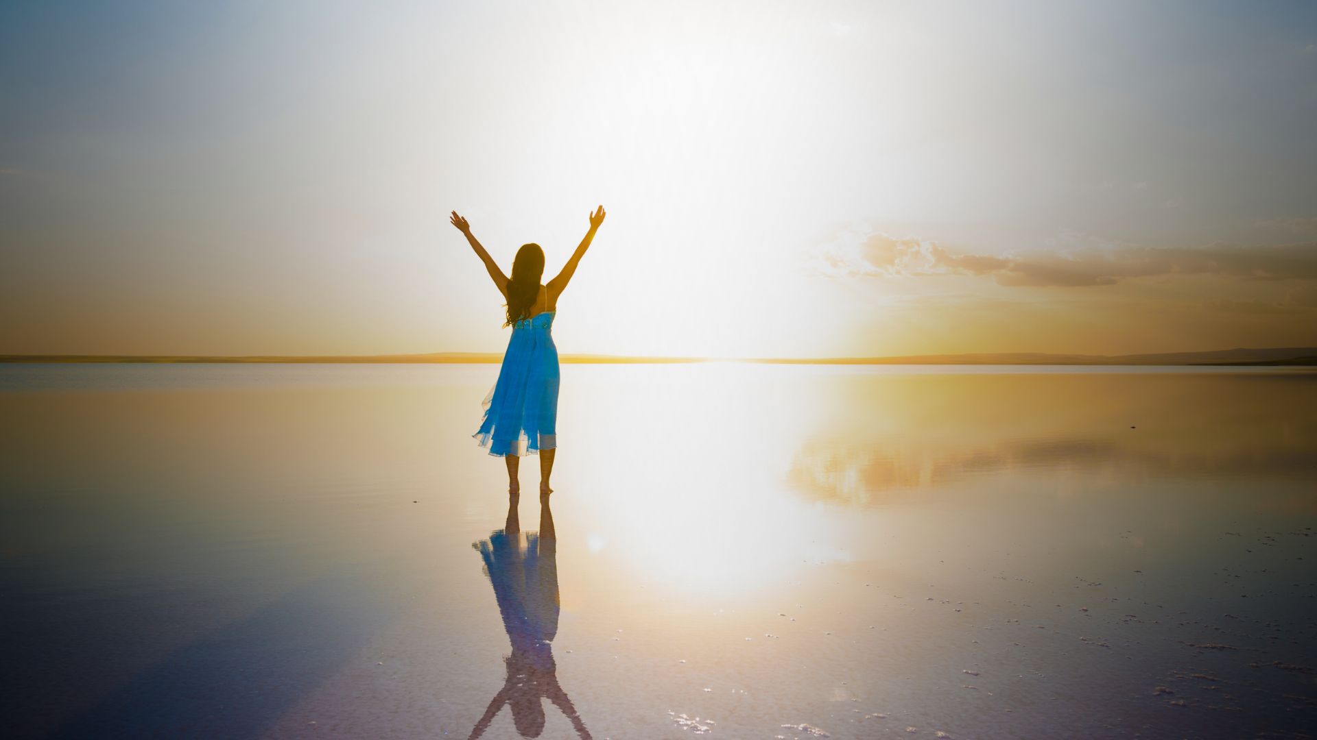 an abstract photo of a curved building with a blue sky in the background