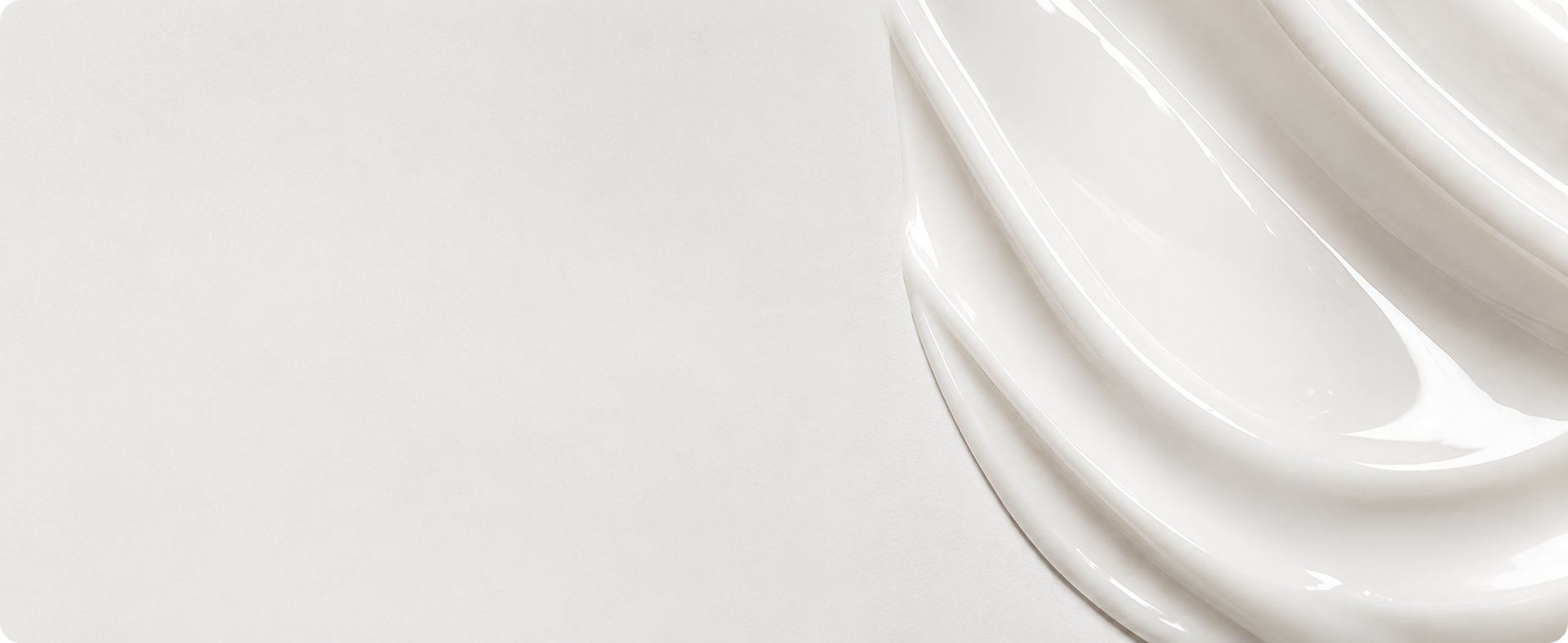stainless steel spoon on white surface