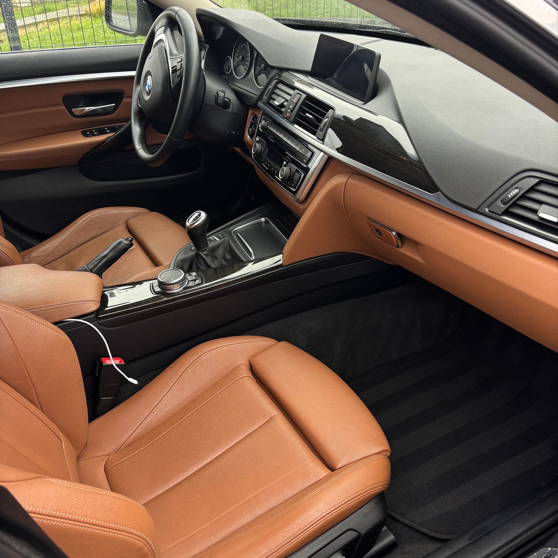 black and brown leather padded tub sofa