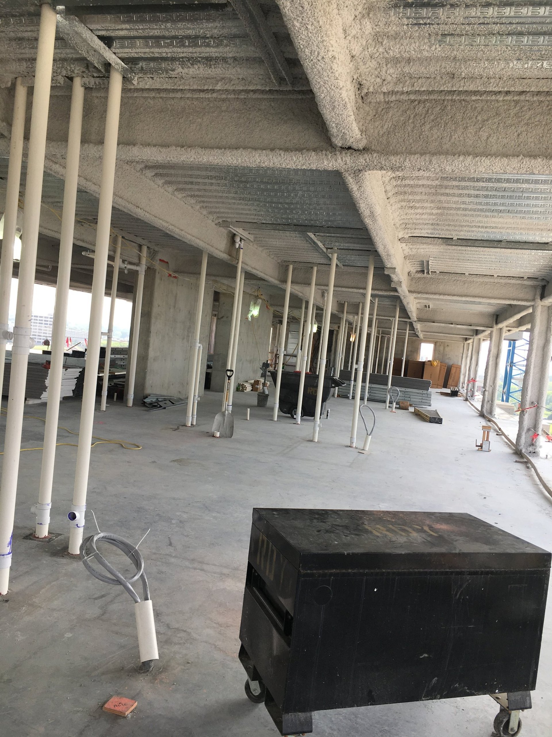 woman wearing yellow long-sleeved dress under white clouds and blue sky during daytime