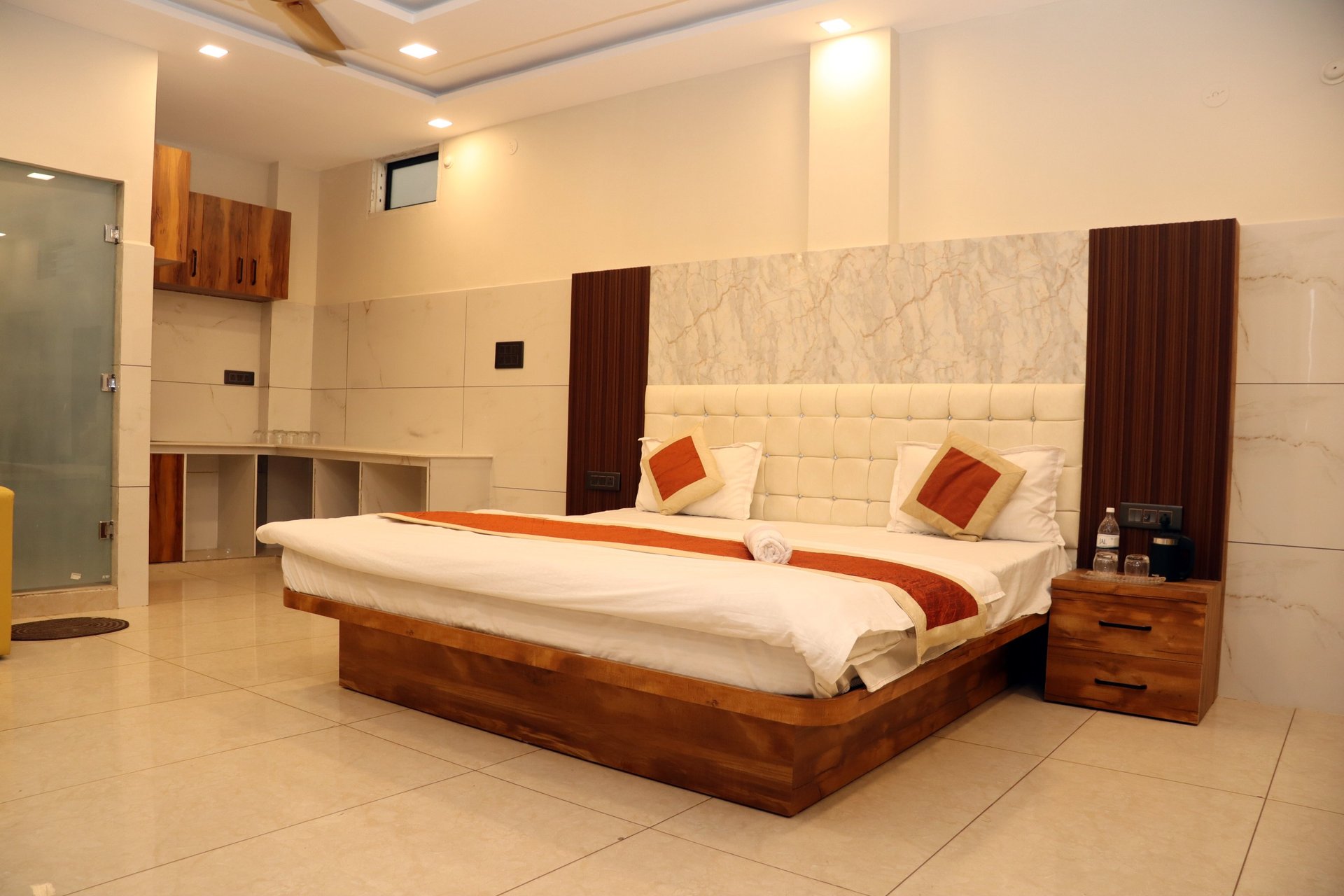 white bed with gray pillow