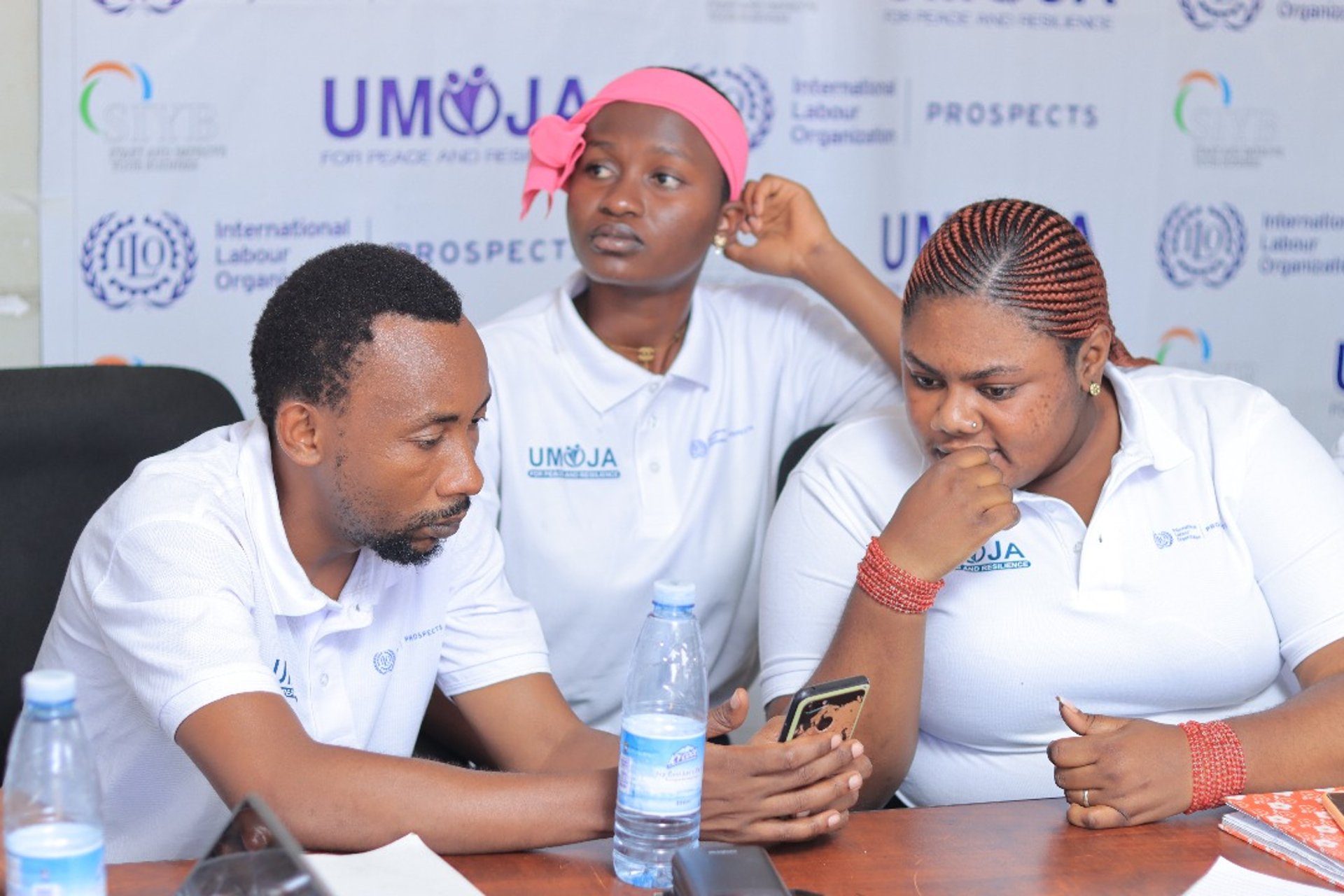 an abstract photo of a curved building with a blue sky in the background