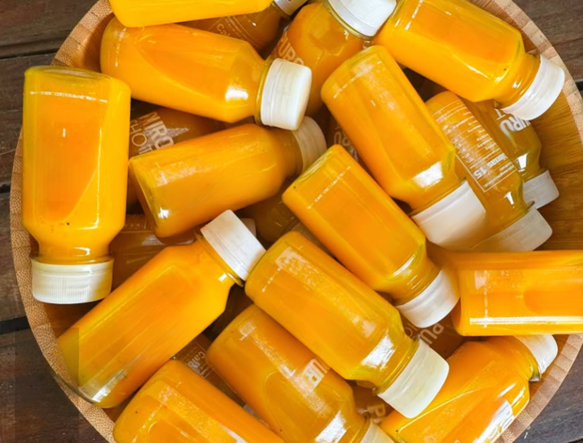 an abstract photo of a curved building with a blue sky in the background