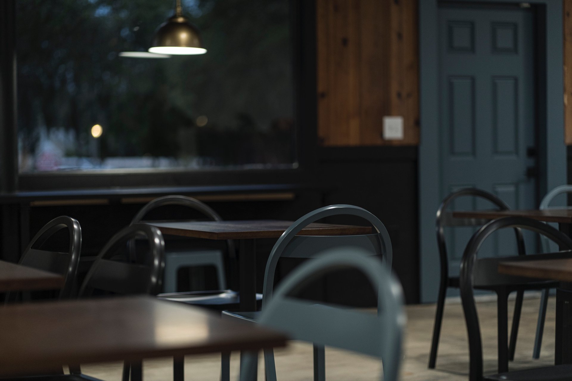 an abstract photo of a curved building with a blue sky in the background