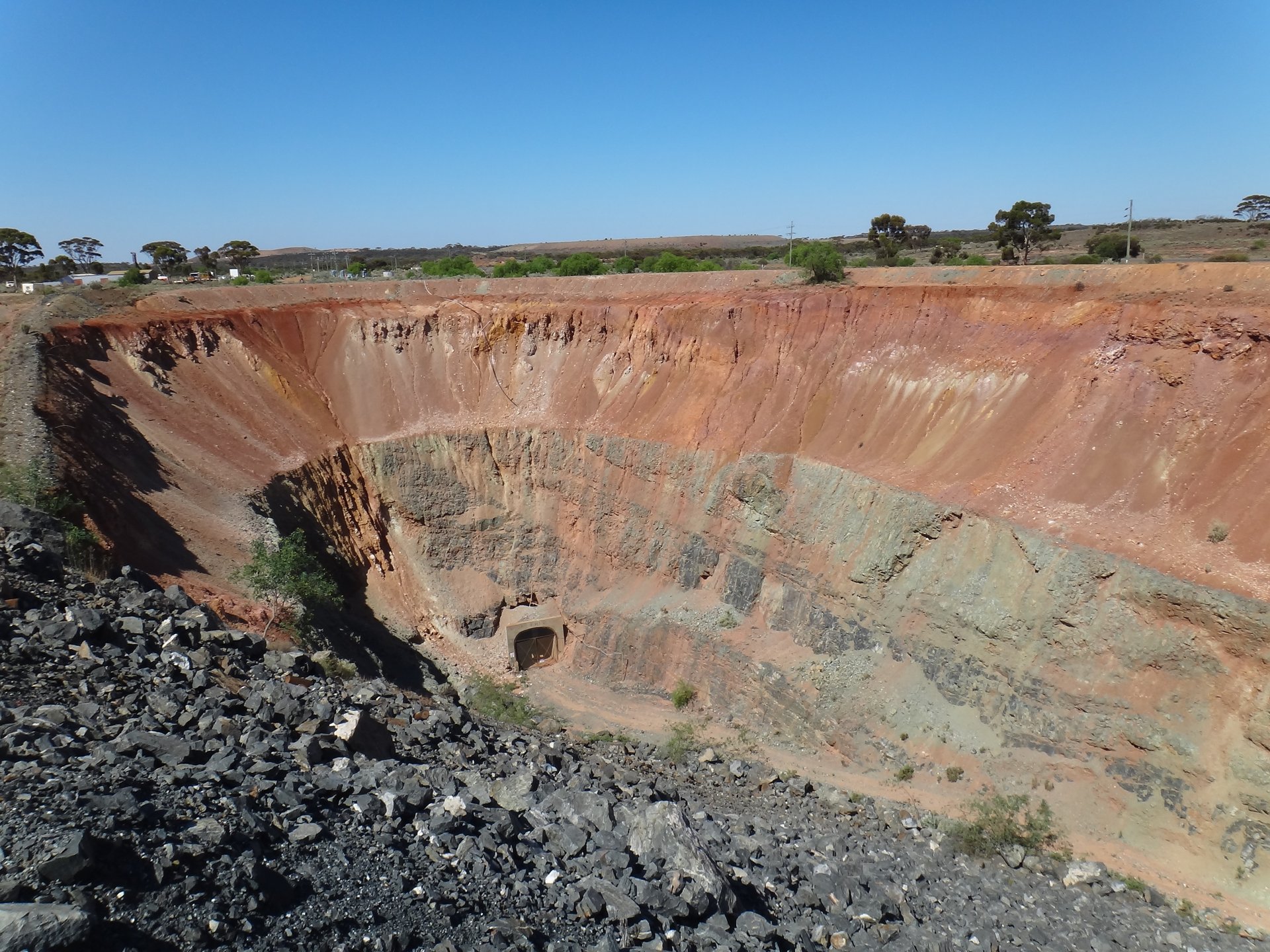 black and brown leather padded tub sofa