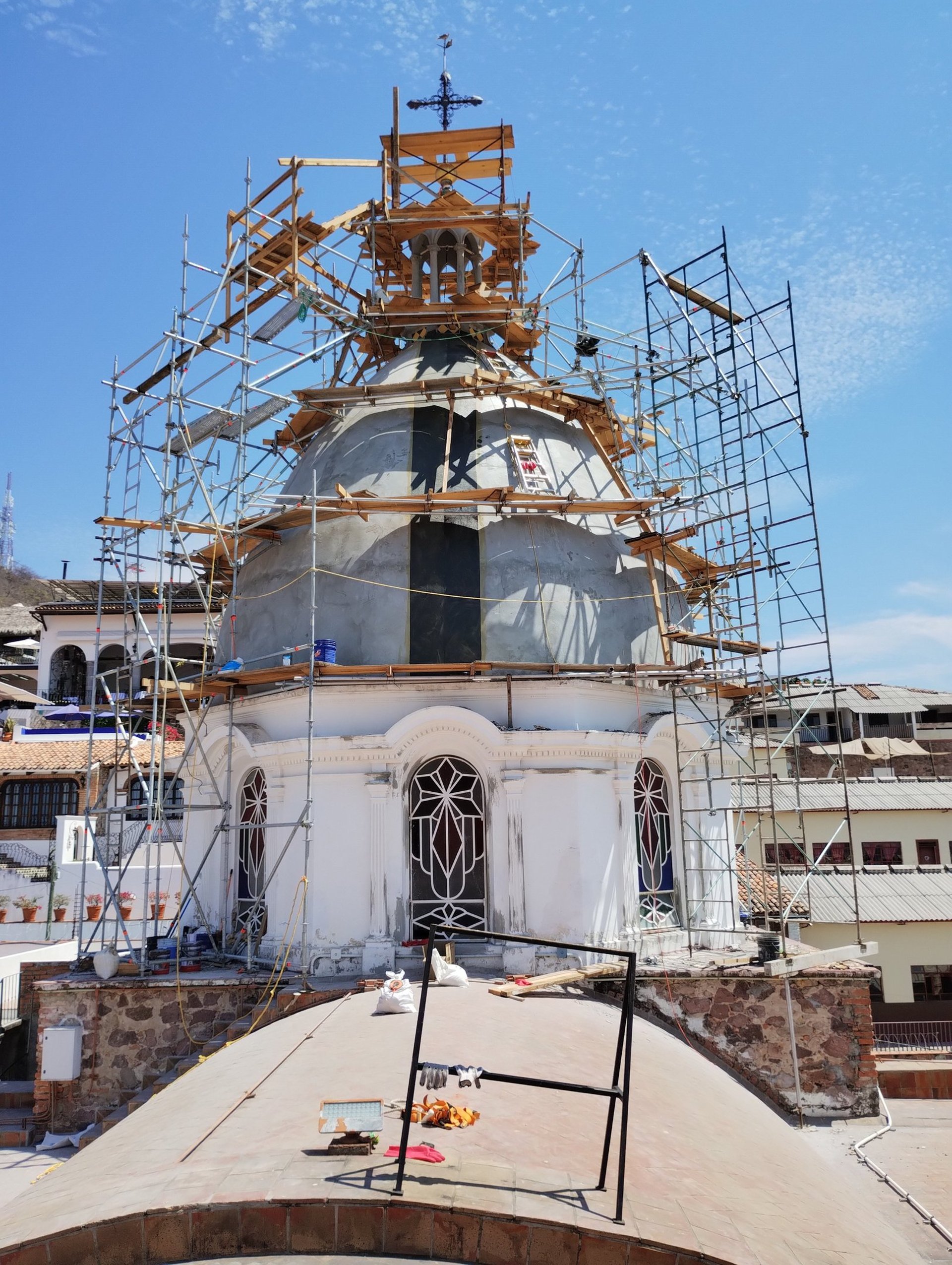 woman wearing yellow long-sleeved dress under white clouds and blue sky during daytime