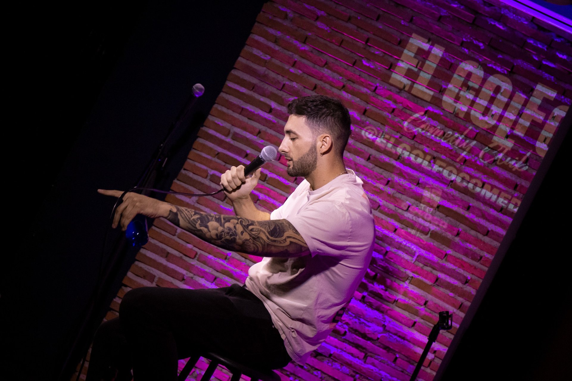 an abstract photo of a curved building with a blue sky in the background