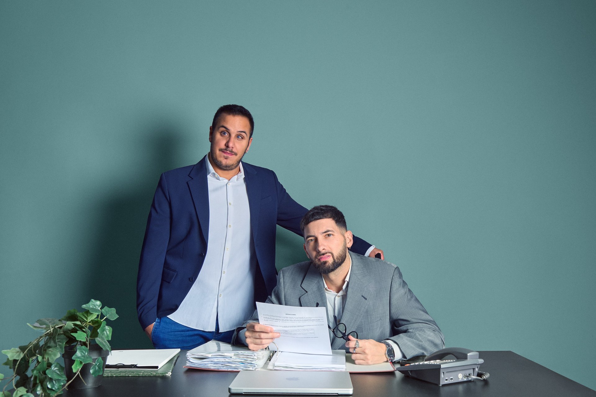 an abstract photo of a curved building with a blue sky in the background