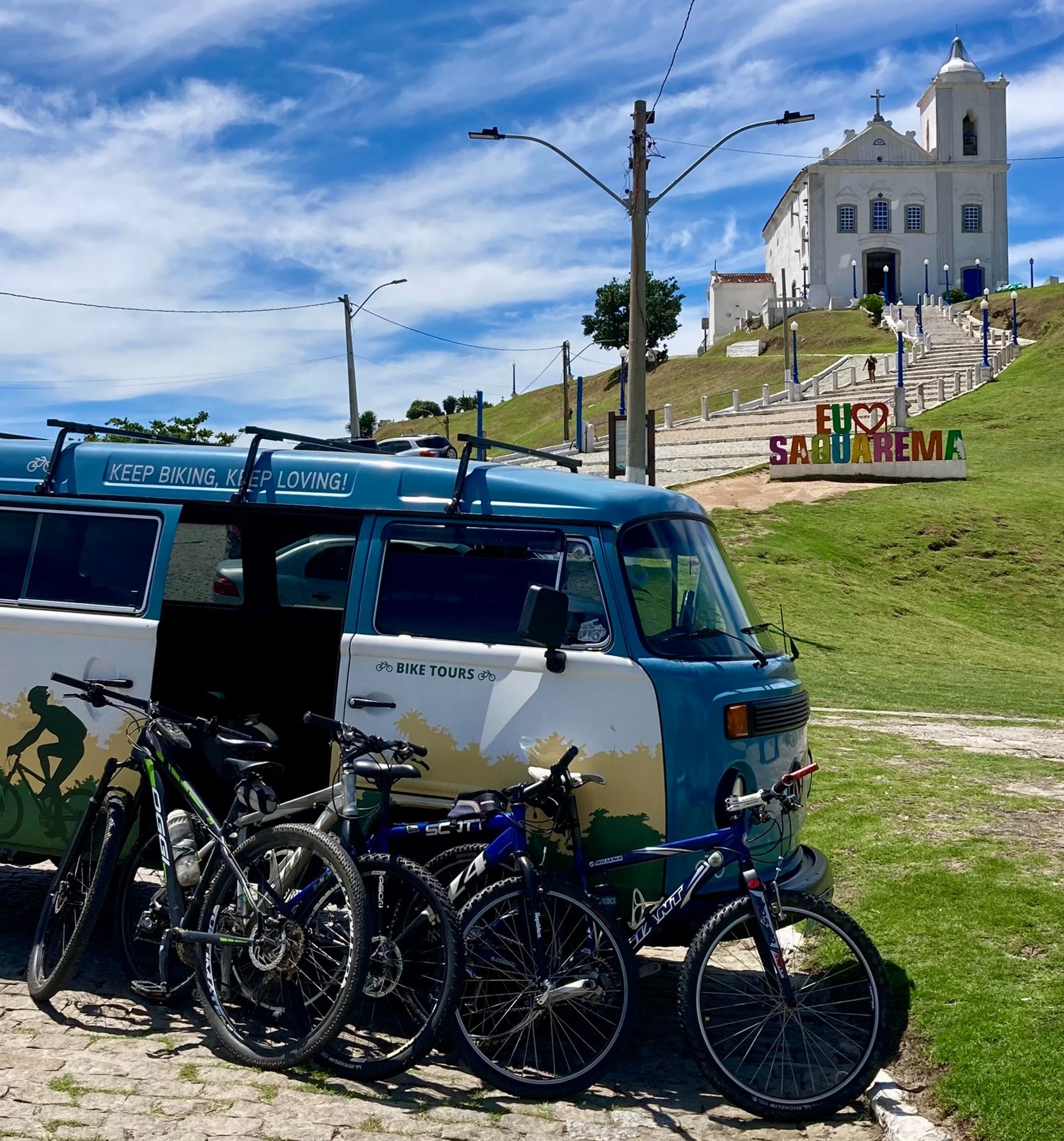 woman wearing yellow long-sleeved dress under white clouds and blue sky during daytime