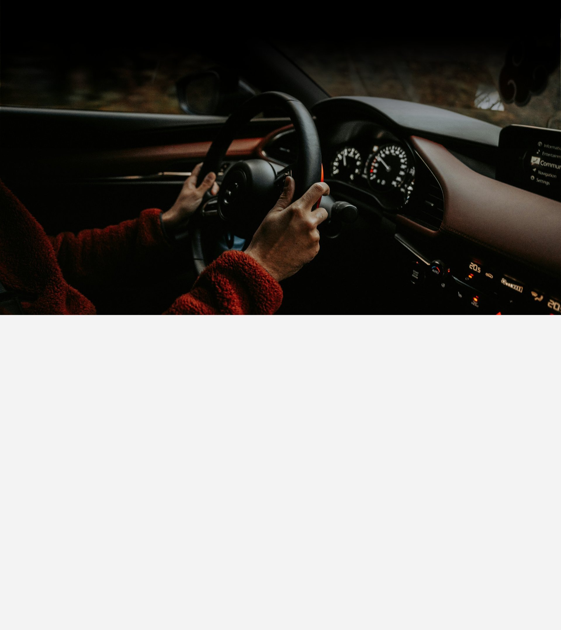 unknown person driving BMW car