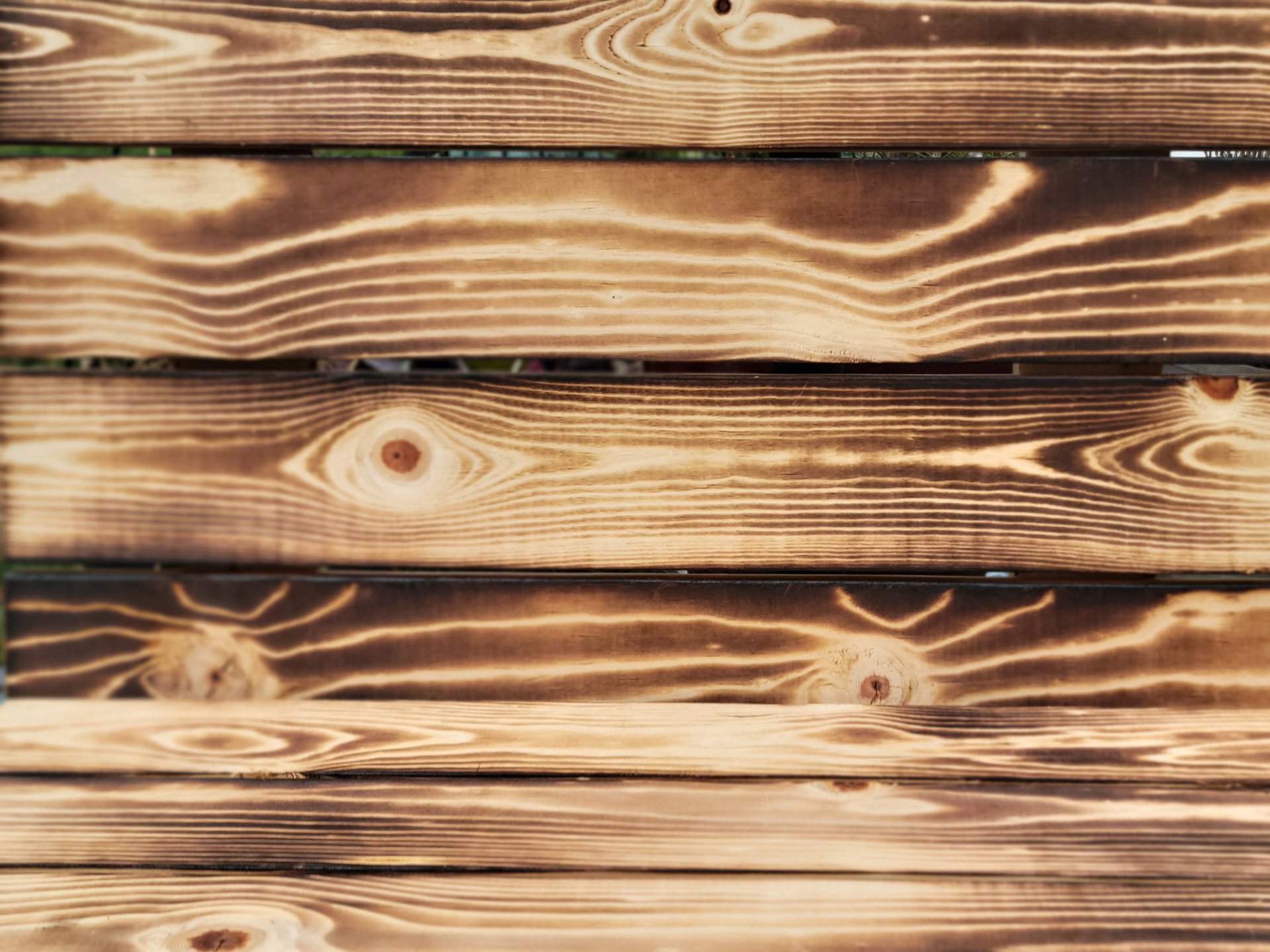 an abstract photo of a curved building with a blue sky in the background