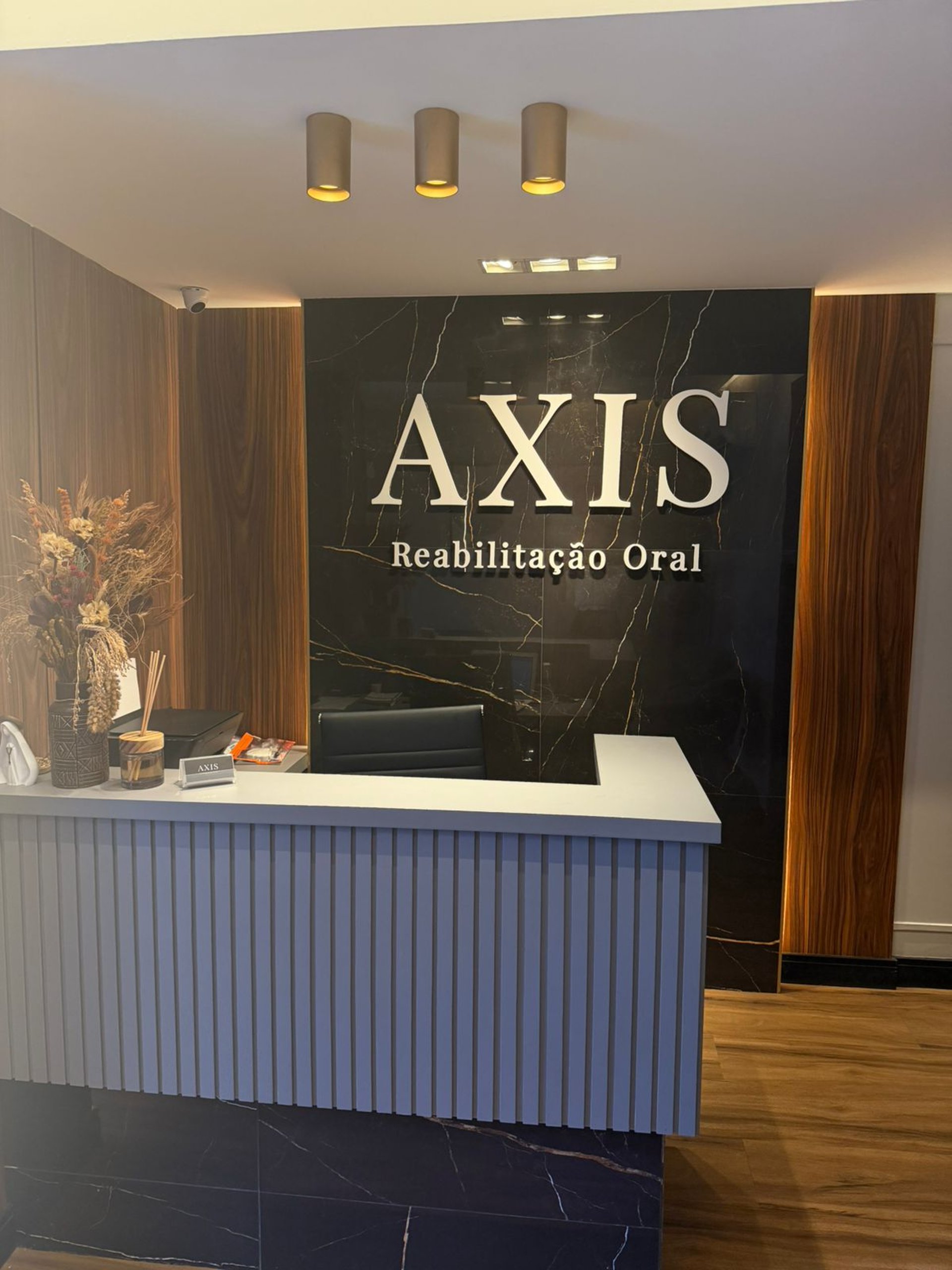 a close up of a woman's mouth with white teeth