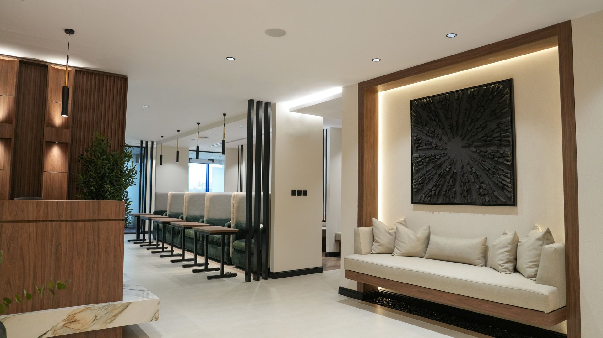 black and brown leather padded tub sofa