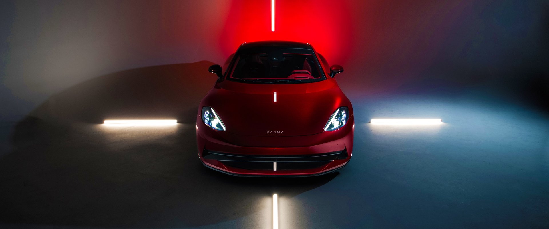 an abstract photo of a curved building with a blue sky in the background