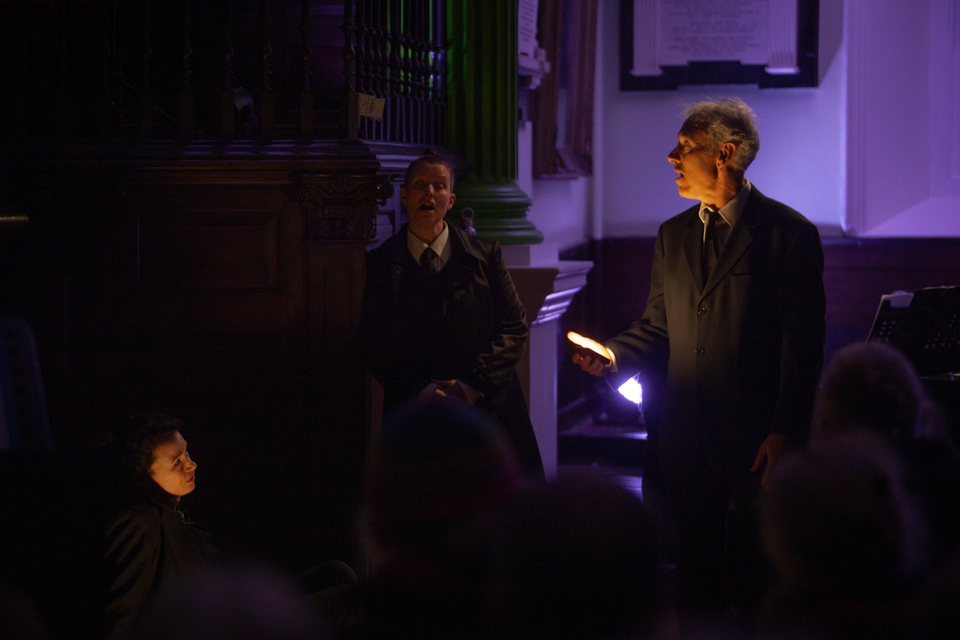 an abstract photo of a curved building with a blue sky in the background