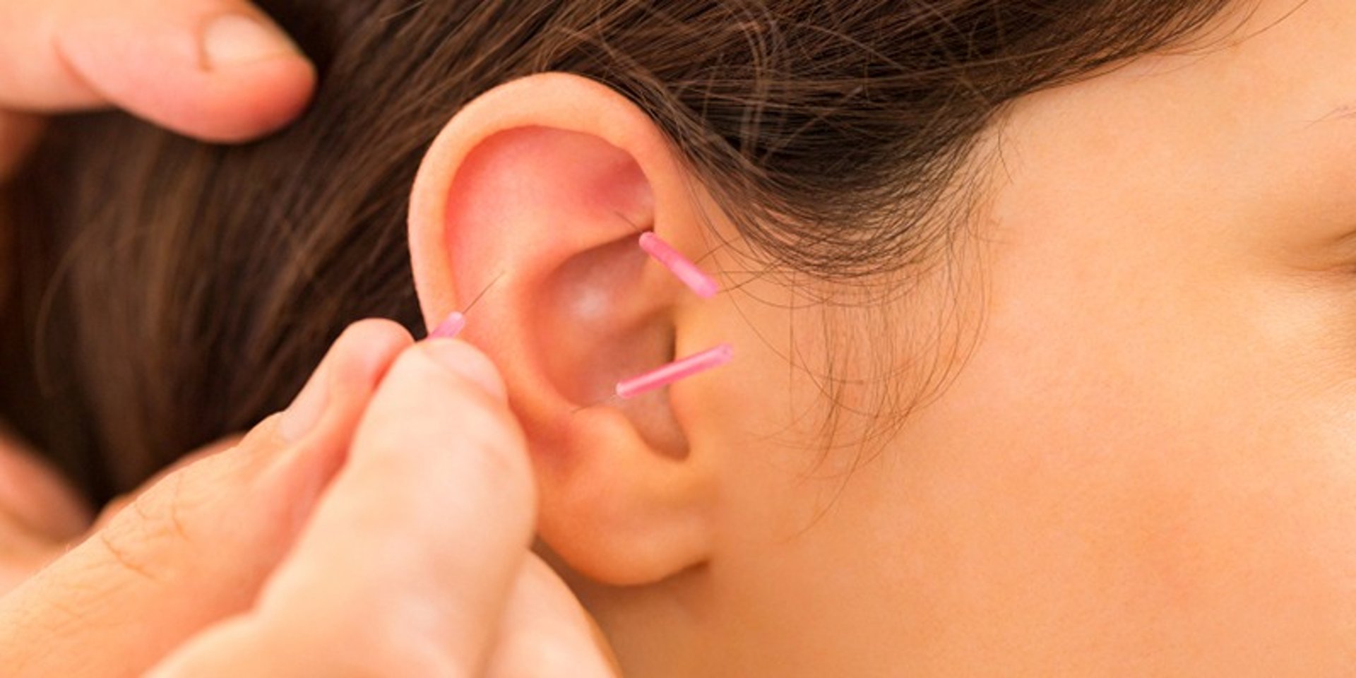 an abstract photo of a curved building with a blue sky in the background