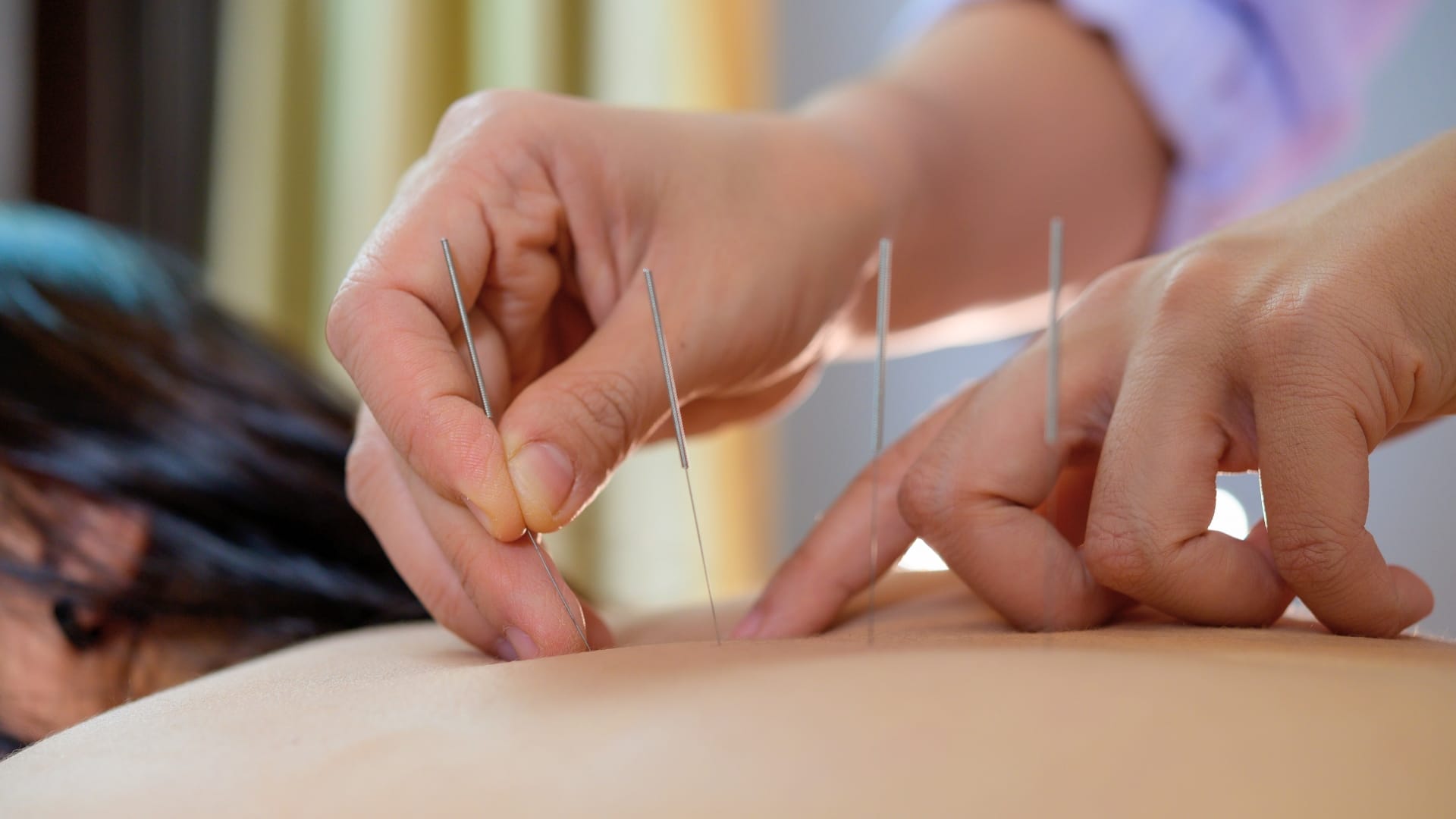 an abstract photo of a curved building with a blue sky in the background