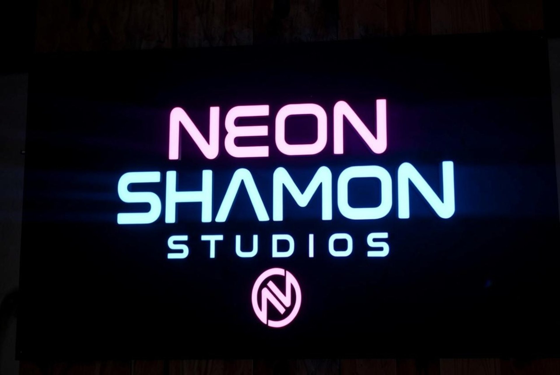 black and brown leather padded tub sofa