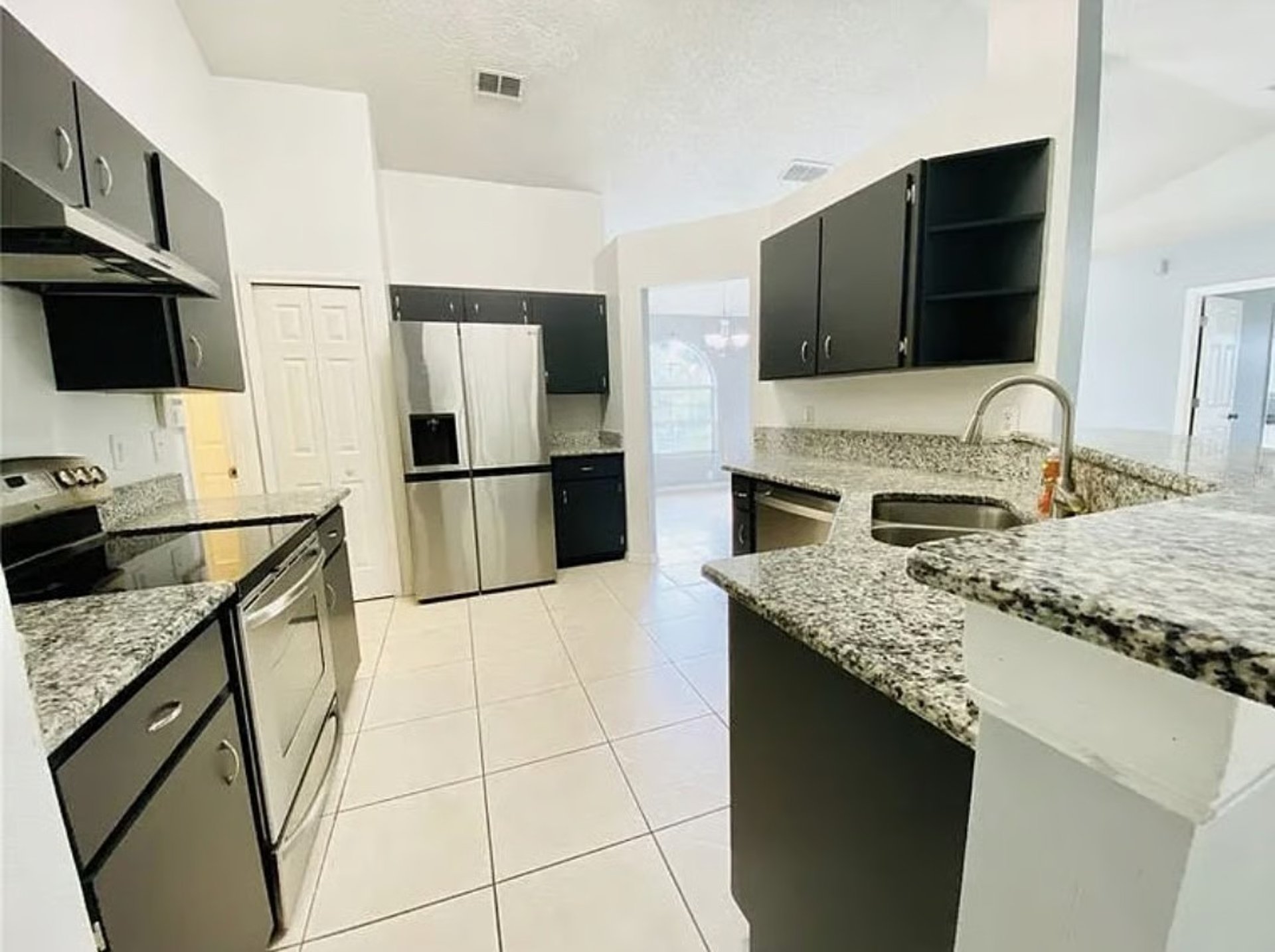 black and brown leather padded tub sofa