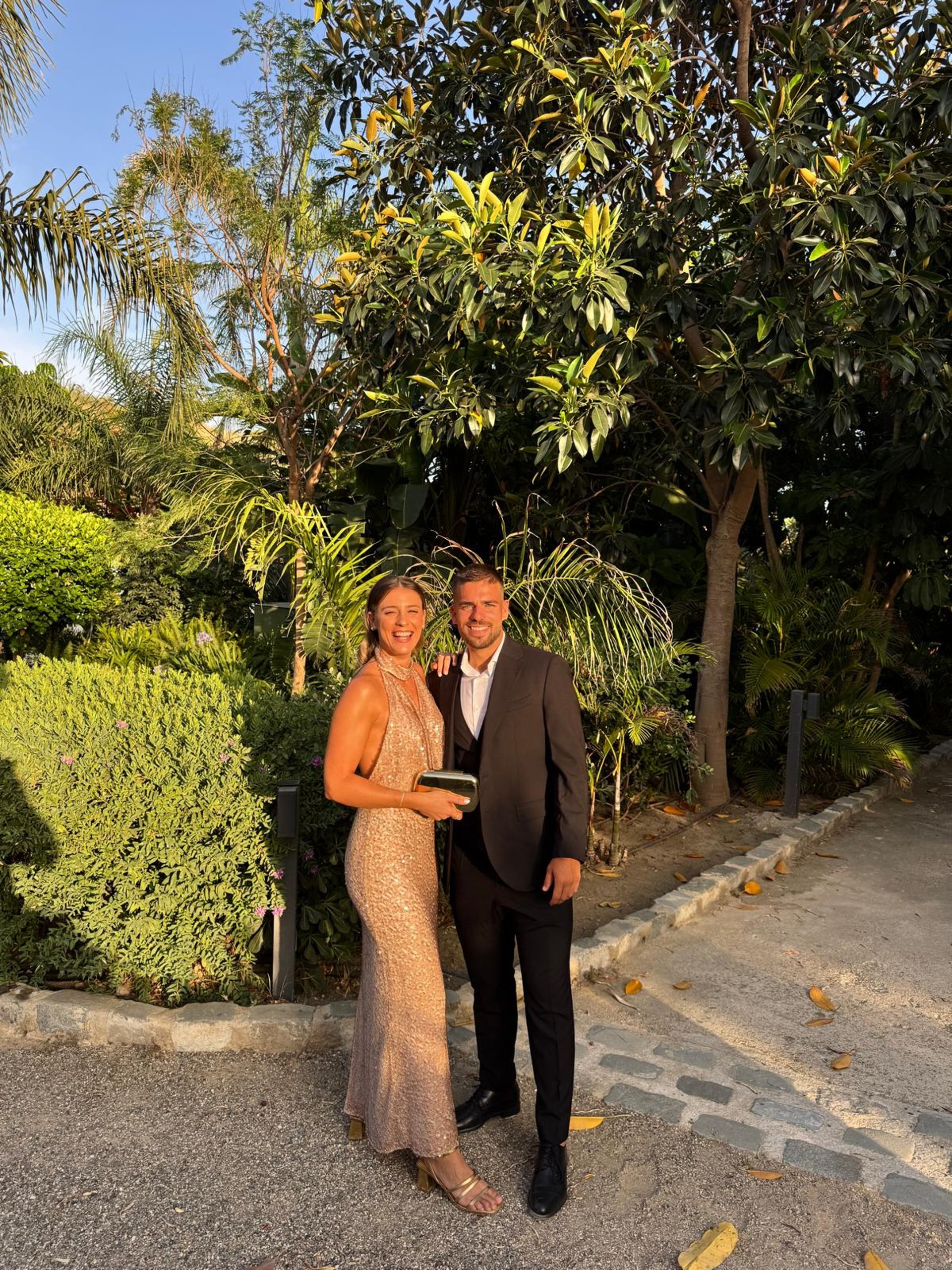 couple wearing silver-colored rings