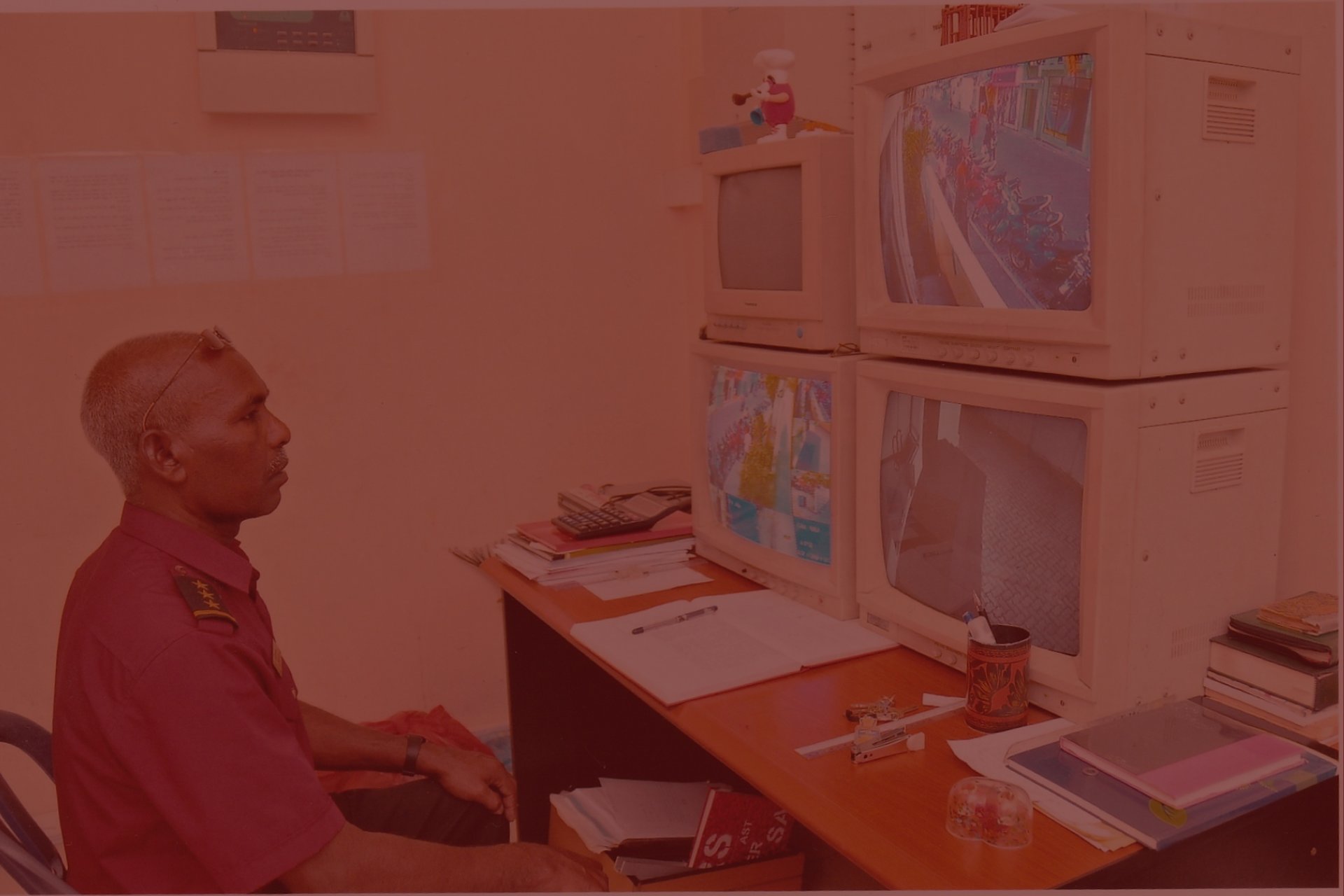 an abstract photo of a curved building with a blue sky in the background