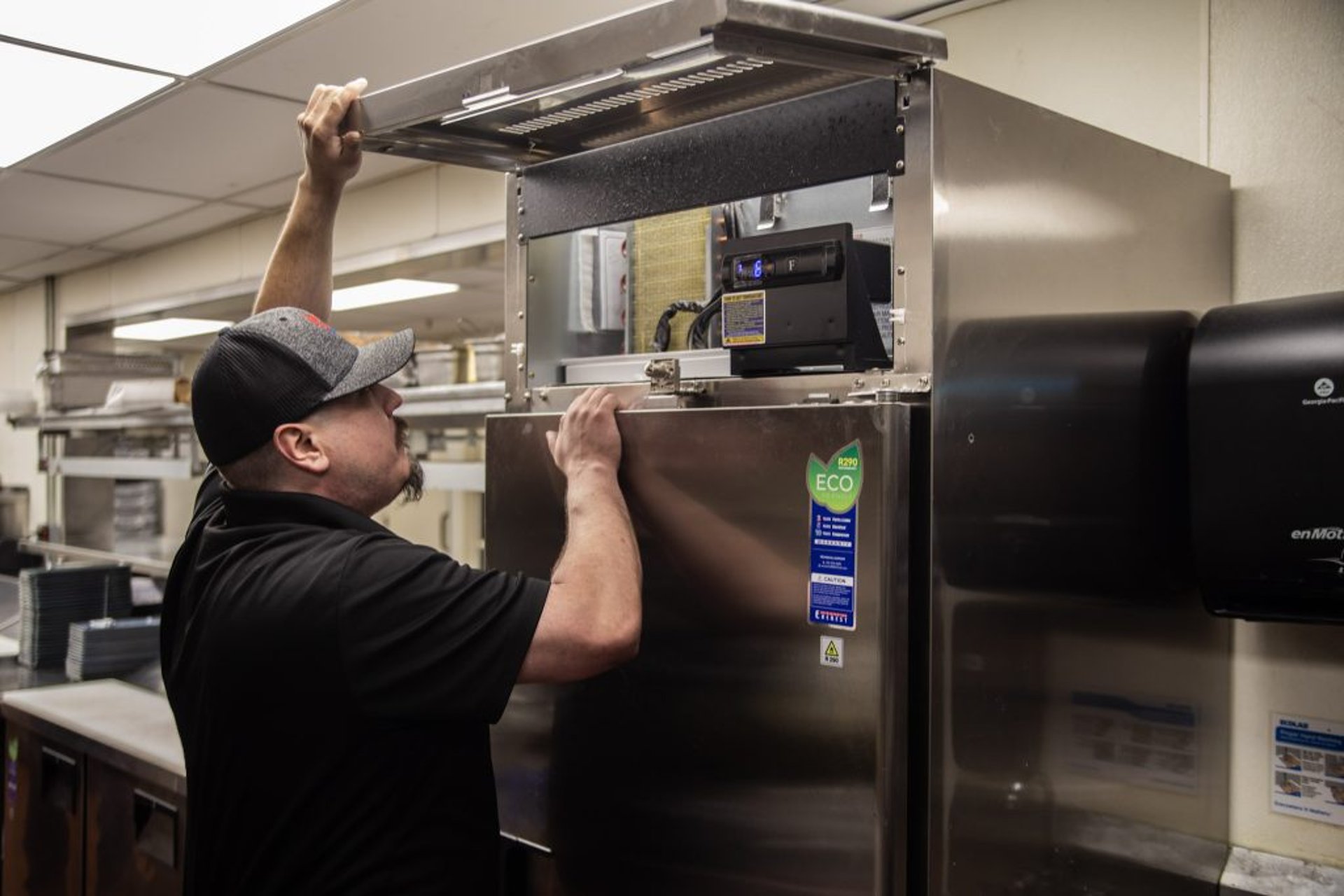 woman wearing yellow long-sleeved dress under white clouds and blue sky during daytime